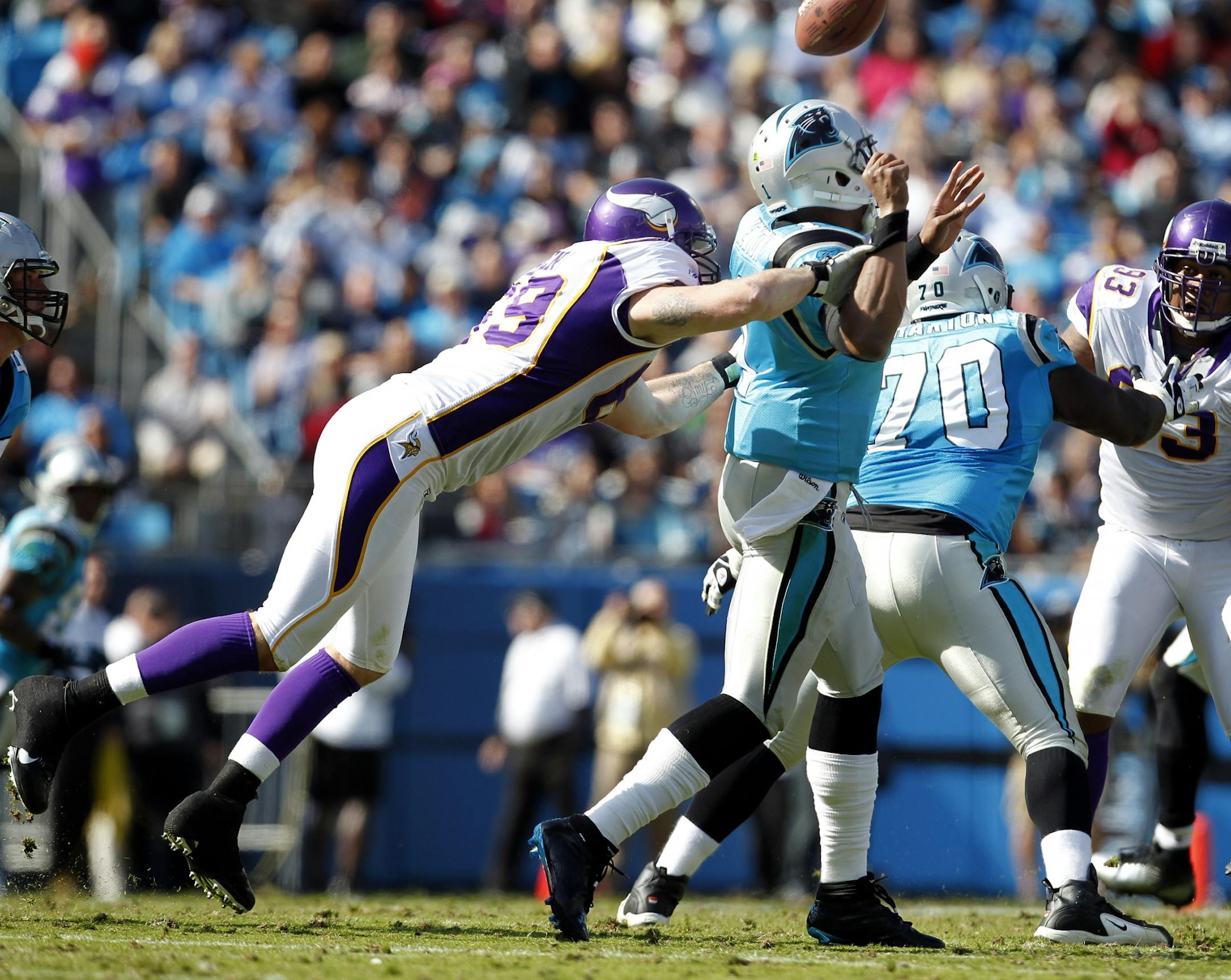 Jared Allen (69) forced Cam Newton (1) to fumble in the second quarter.