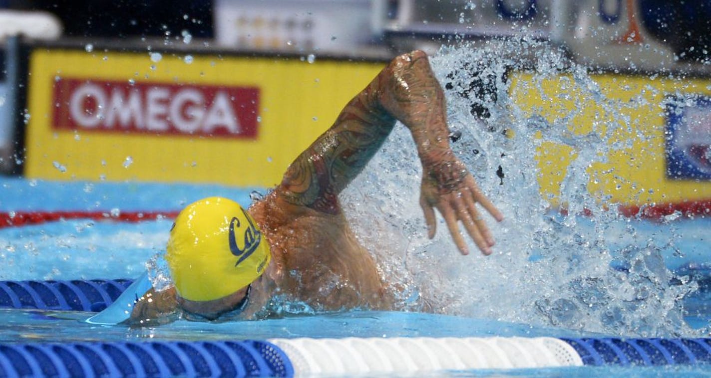 Anthony Ervin swims in a men's 50-meter freestyle semifinal at the U.S. Olympic swimming trials, Saturday, June 30, 2012, in Omaha, Neb.