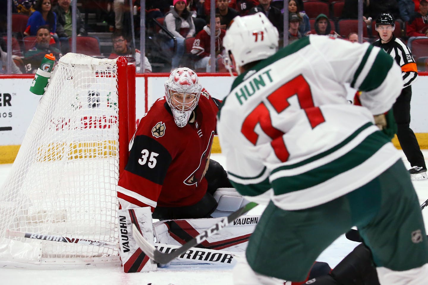 Minnesota Wild defenseman Brad Hunt (77) scores a goal against Arizona Coyotes goaltender Darcy Kuemper (35) during the third period of an NHL hockey game Thursday, Dec. 19, 2019, in Glendale, Ariz. The Wild won 8-5. (AP Photo/Ross D. Franklin)