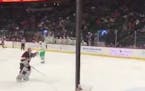 Sweet moment of goofy sportsmanship at state hockey