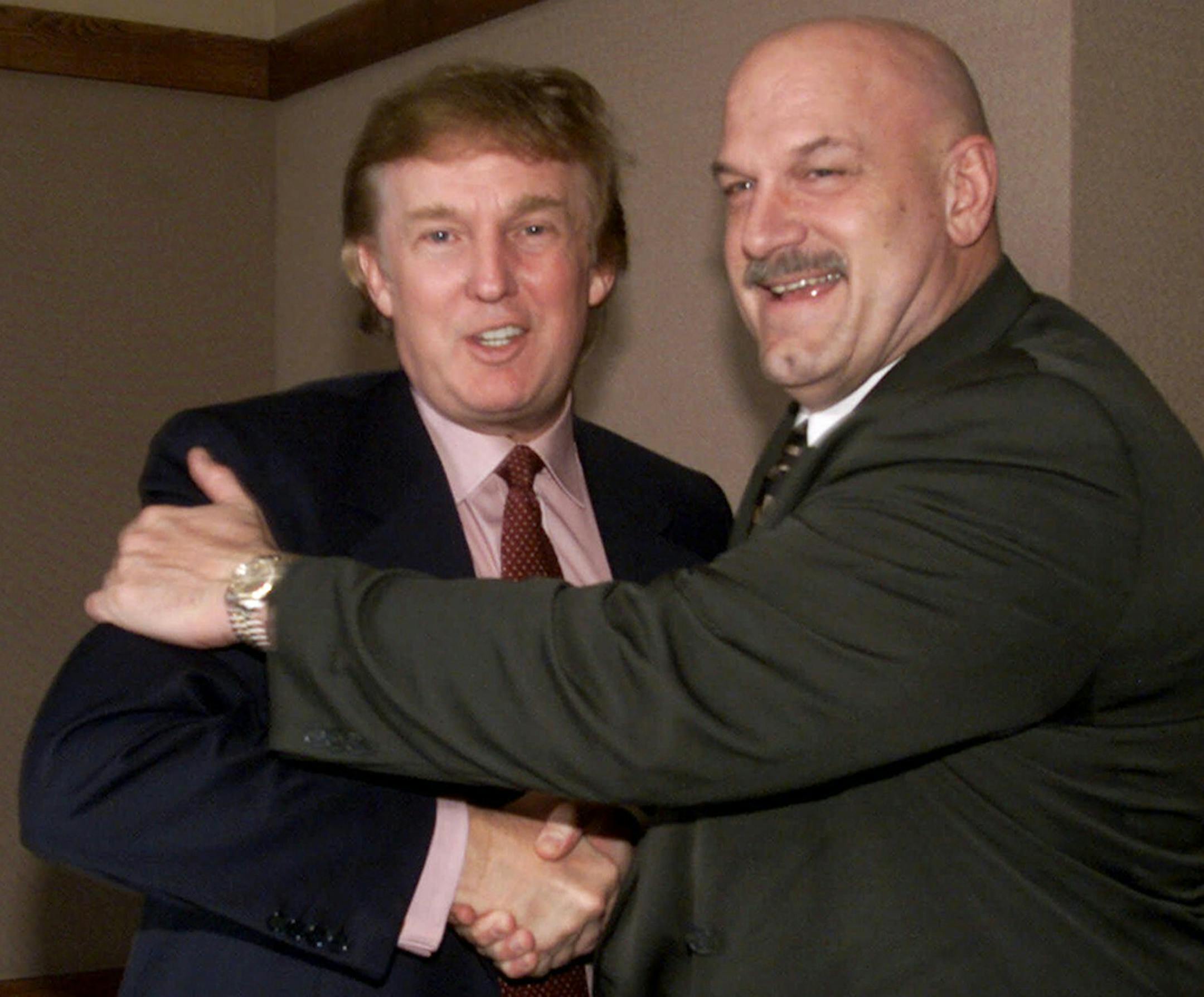 FILE - In this Jan. 7, 2000 file photo, potential Reform Party presidential candidate Donald Trump, left, greets Minnesota Gov. Jesse Ventura in Minneapolis. Ventura said Wednesday, Aug. 12, 2015 that he hopes Trump wins the Republican nomination for president and would be open to running as his vice president. (AP Photo/Richard Drew, File)
