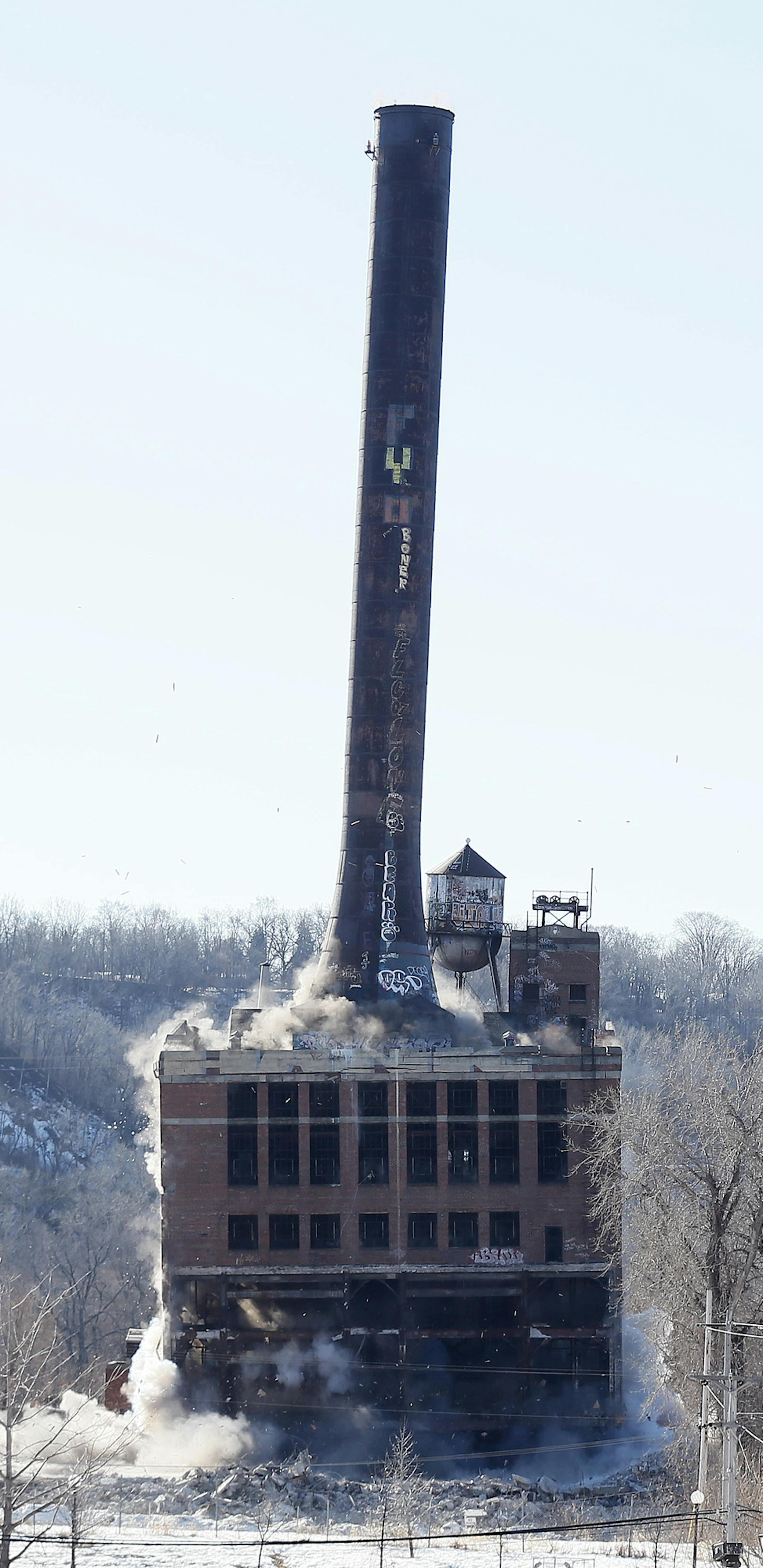 A St. Paul landmark was brought down with a blast on Sunday morning March 16, 2014. A coal-fired power plant on the Mississippi River, upstream from downtown St. Paul. The 10-story building was topped by a 180-foot smokestack. The blast was at 10 a.m. Sunday. in St. Paul, MN. ] JERRY HOLT jerry.holt@startribune.com