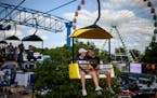 A couple rides the SkyGlider on the last day of the 2022 Minnesota State Fair.