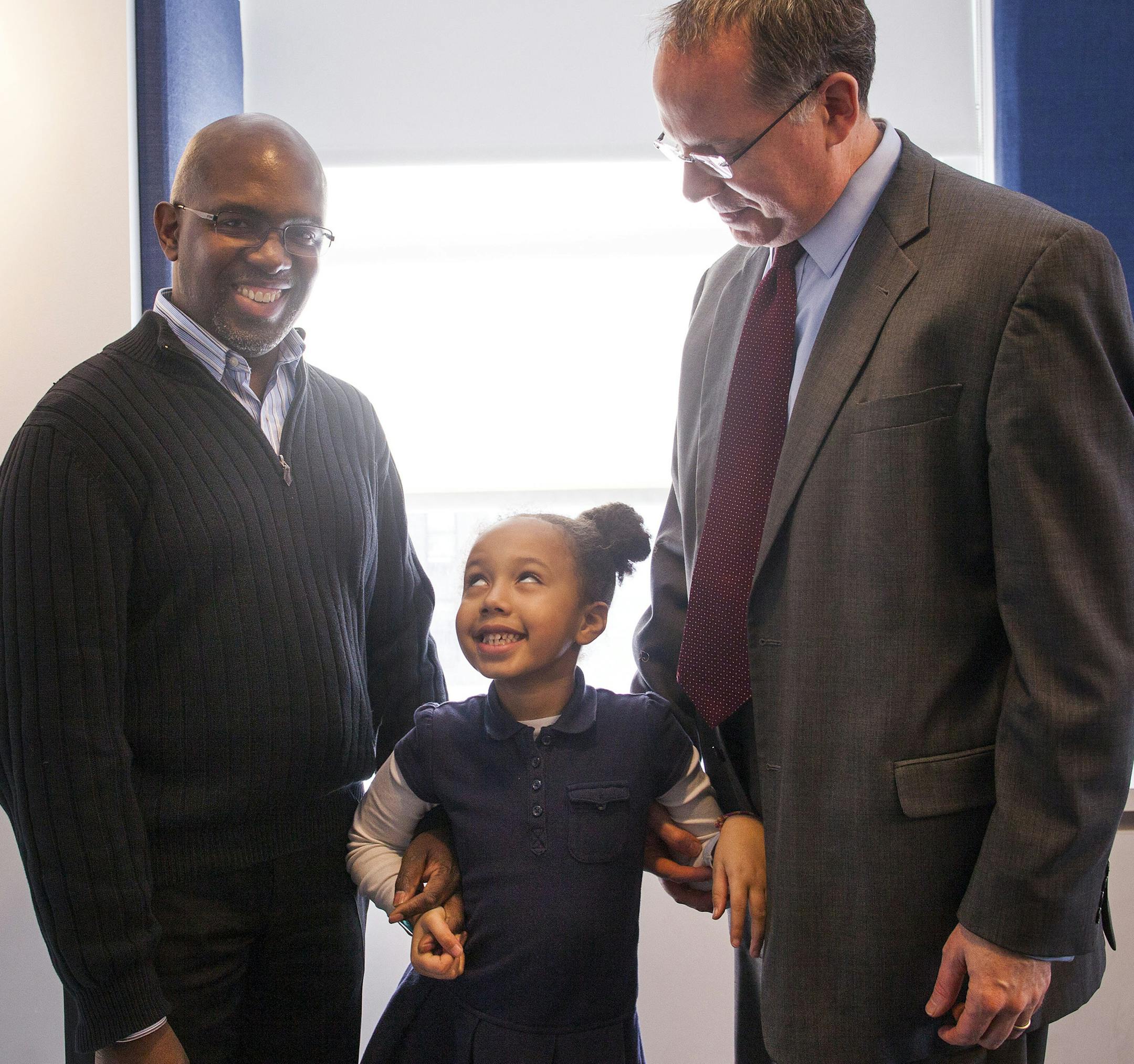 Kevin Ryan-Young, left, and Timm Ryan-Young, a married gay couple, with their daughter Zelia Ryan-Young, 6, at their home in New York, March 20, 2013.
The American Academy of Pediatrics declared its support for civil same-sex marriage for the first time on Thursday, saying that allowing gay and lesbian parents to marry if they so choose is in the best interests of their children. (Michael Nagle/The New York Times)