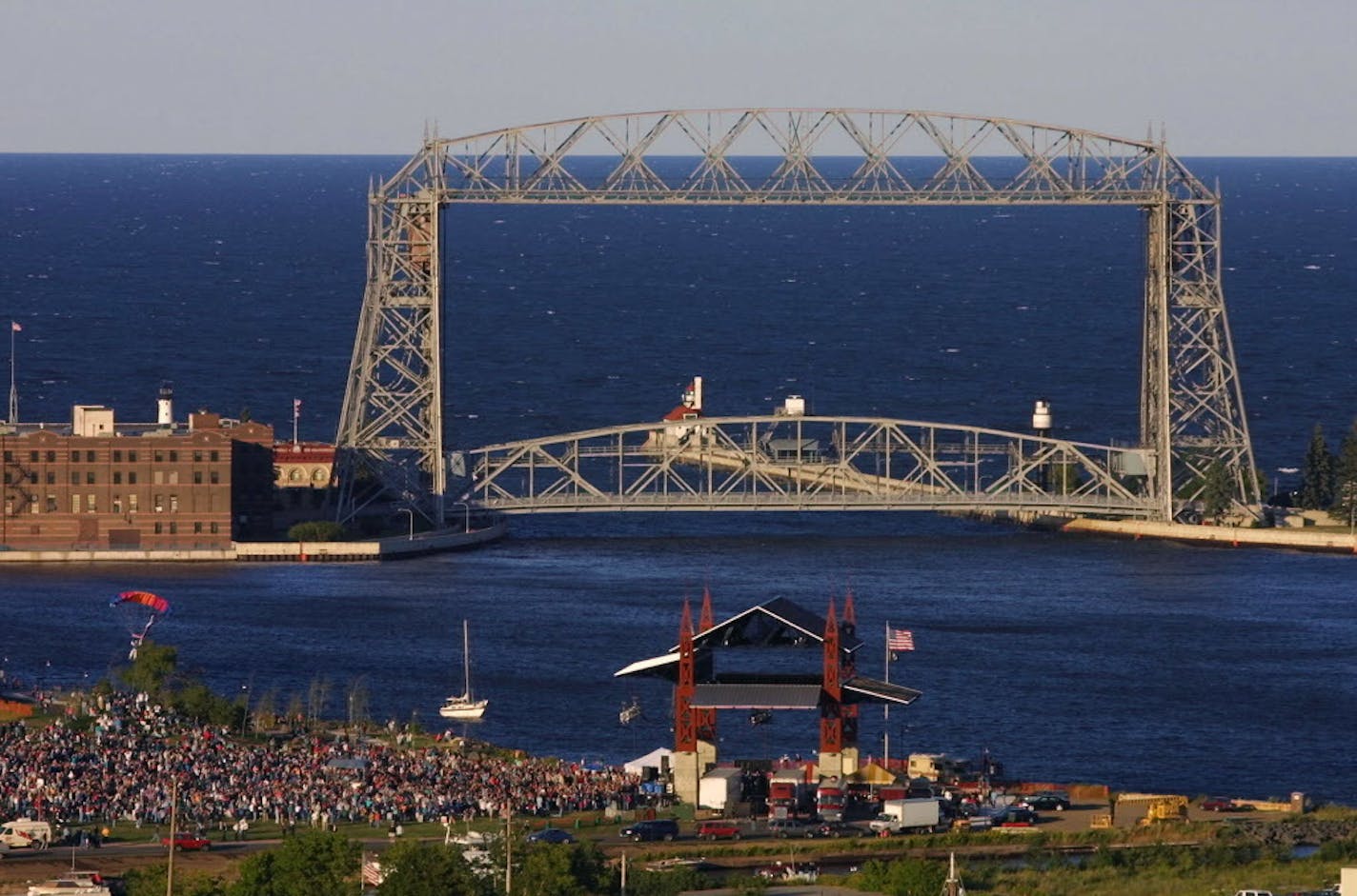 Skydivers descended to the new Bayfront Festival Park in Duluth during dedication ceremonies at the first event held there Thursday night. Credence Clearwater Revisited were the headliners of a bill that also included the Teddy Bear Band. ORG XMIT: MIN2013062111361140