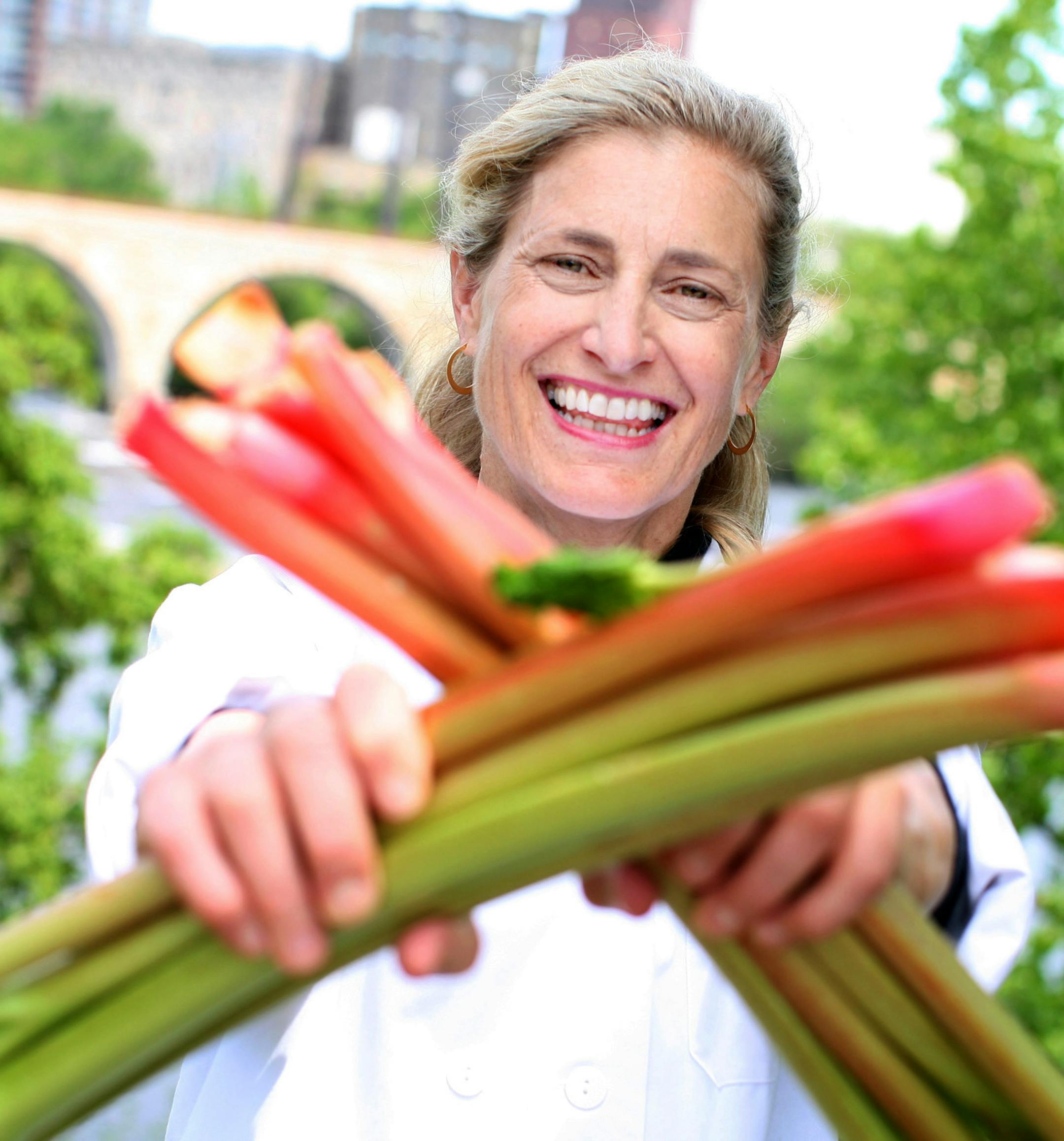 Chef Lucia Watson, proprietor of Lucia‚Äôs Restaurant, Wine Bar, and Lucia‚Äôs To Go, strikes a power pose with rhubarb in downtown Minneapolis May 24, 2013. (Courtney Perry/Special to the Star Tribune)