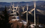 FILE - In this March 19, 2019 file photo, the blades of wind turbines catch the breeze at the Saddleback Ridge wind farm in Carthage, Maine. Scientist