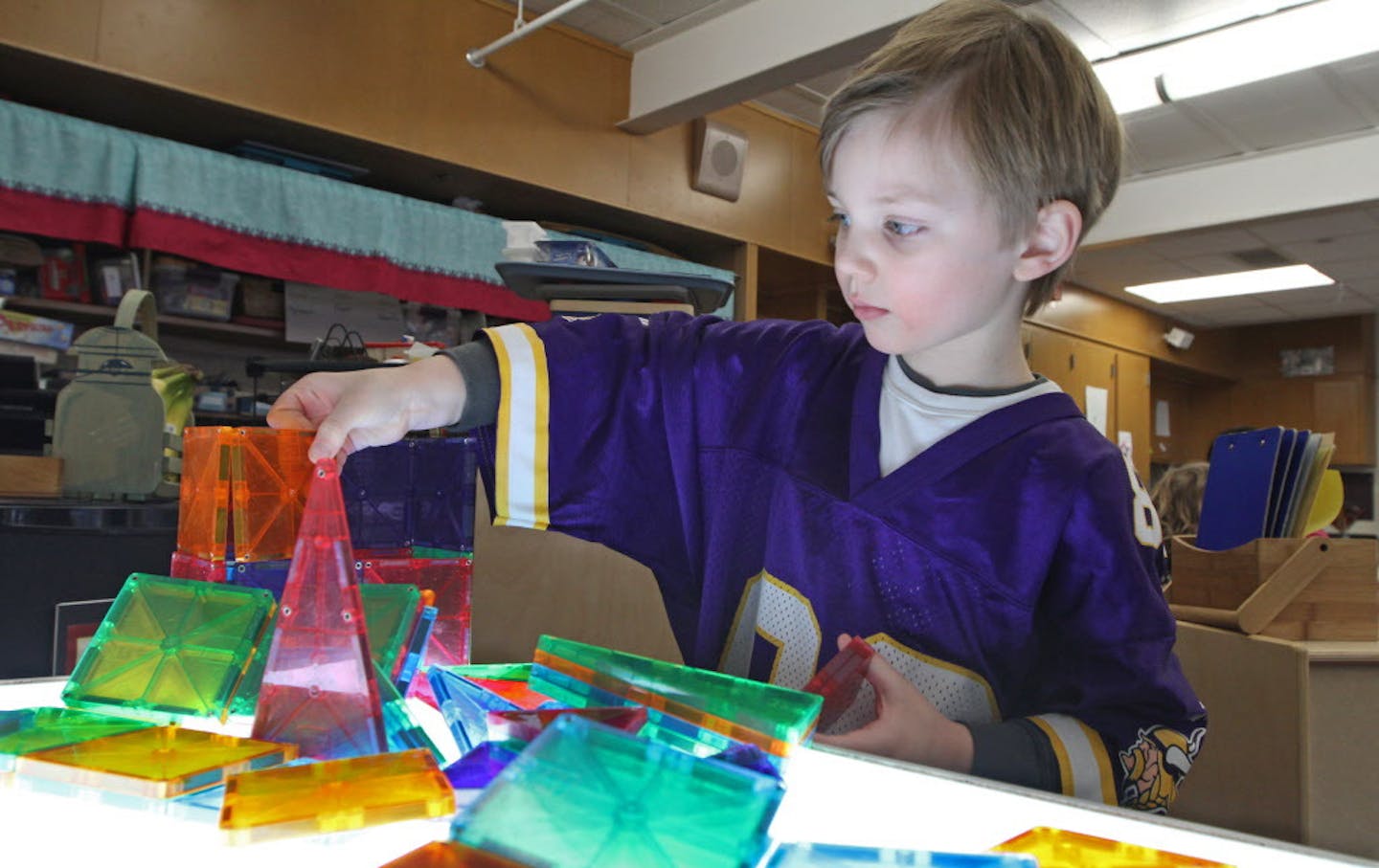 (right) Noah Carr worked with plastic building blocks placed on a light table, during Lucy Lyons preschool class at Glen Lake Elementary School in Hopkins on 1/16/13. Preschoolers in Hopkins this year are learning the basic vocabulary of engineering -- one of the few programs in the state and country starting science, engineering, technology and math, or STEM, at such an early age. In the last few years, STEM programs have increased across Minnesota schools, mostly in middle schools. But in Hopk