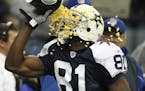 Terrell Owens throws popcorn in his face after scoring a touchdown vs. Green Bay in 2007.
