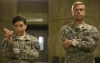 Francois Duhamel/Netflix John Magaro and Brad Pitt in "War Machine."