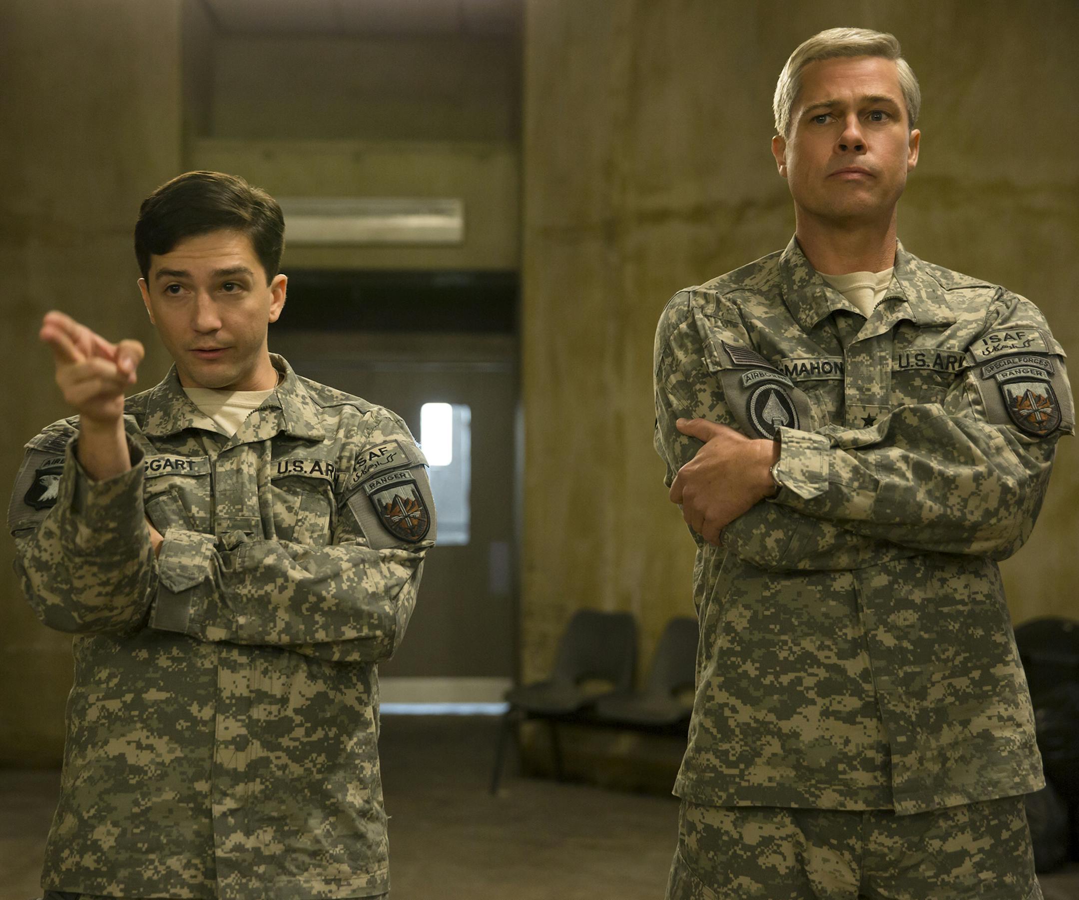 Francois Duhamel/Netflix John Magaro and Brad Pitt in "War Machine."