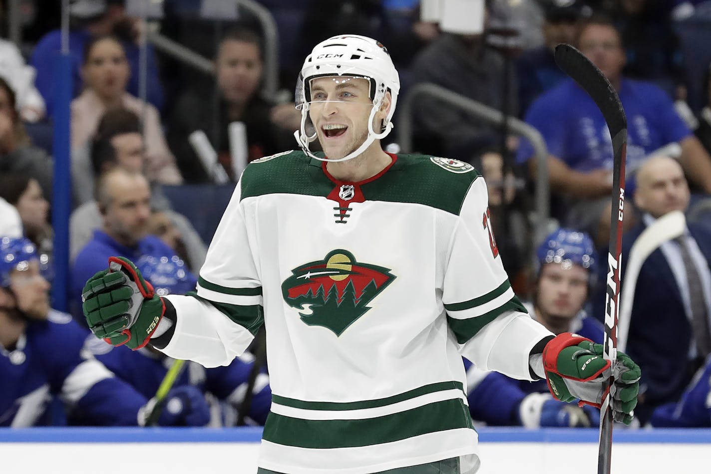 Minnesota Wild defenseman Carson Soucy (21) celebrates after scoring against the Tampa Bay Lightning during the first period of an NHL hockey game Thursday, Dec. 5, 2019, in Tampa, Fla. (AP Photo/Chris O'Meara)