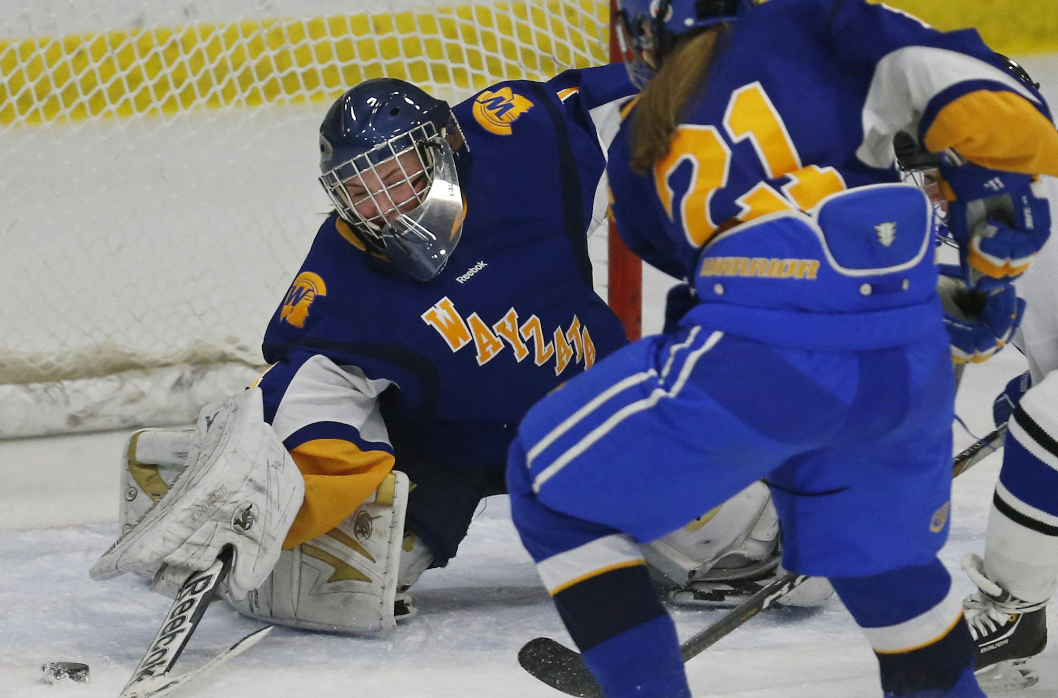 At Minnetonka H.S. in a girls hockey game against Wayzata, goalie Sarah Stelter(1) makes a save in the second period.]richard tsong-taatarii/rtsong-taatarii@startribune.com