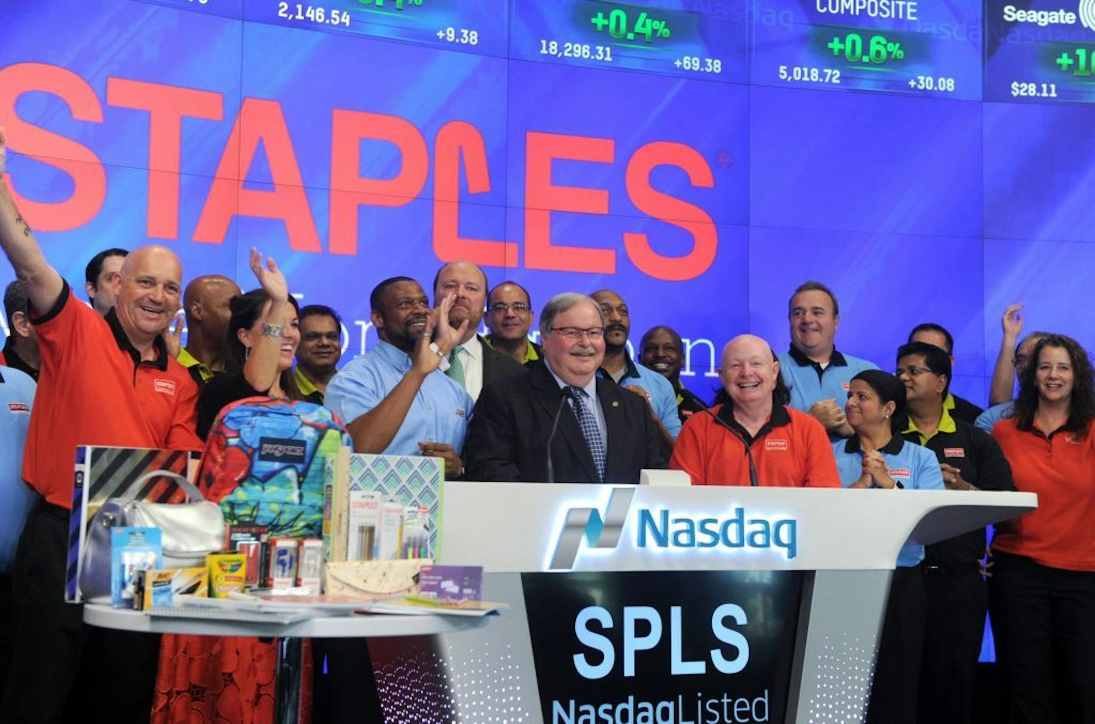 IMAGE DISTRIBUTED FOR STAPLES - Steven Matyas, center, president of North American retail at Staples Inc., kicks off the 2016 back-to-school season at the NASDAQ Opening Bell Ceremony in New York, Tuesday, July 12, 2016, announcing that Staples has all of the products students need at the lowest prices, guaranteed.