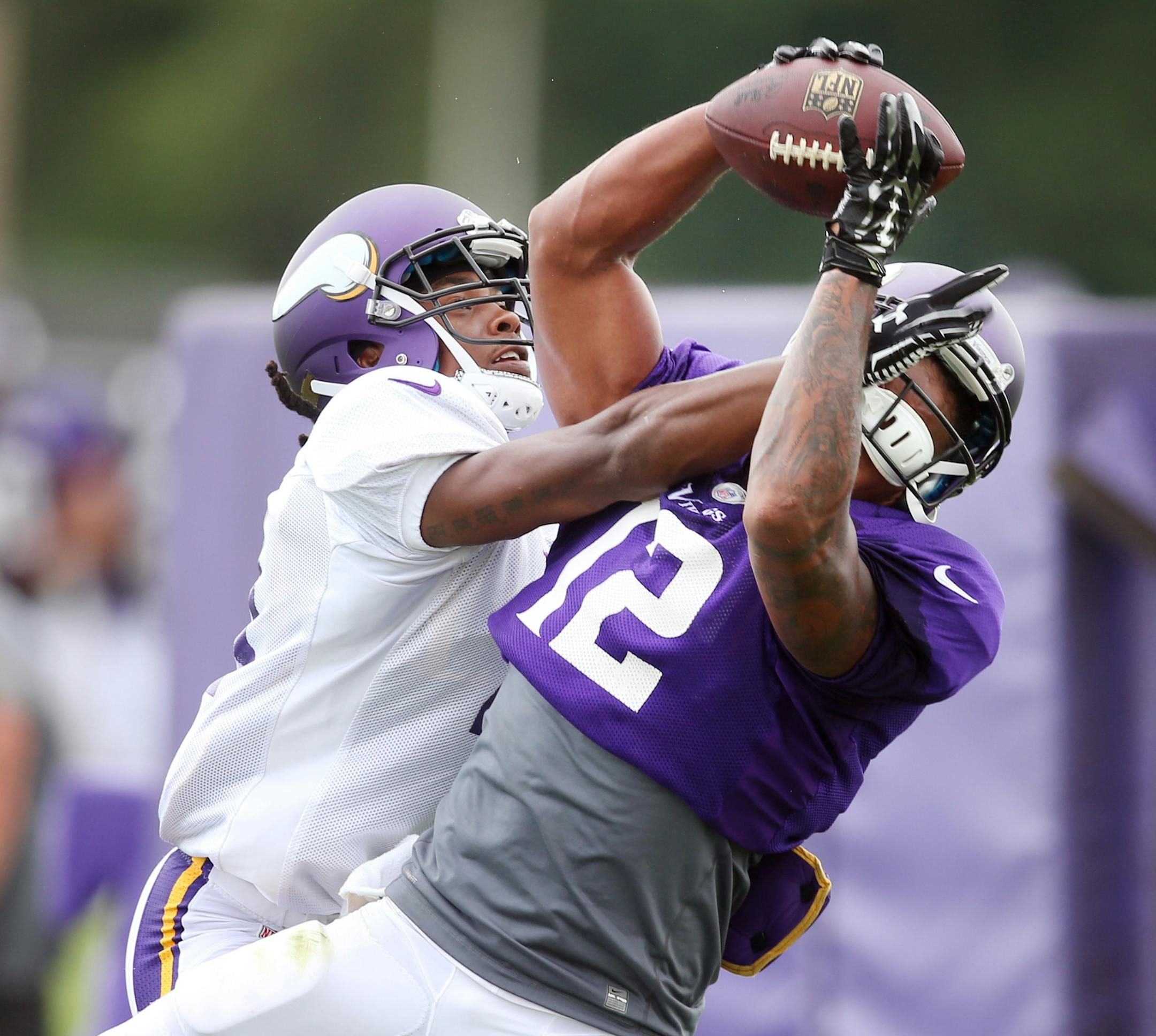 Charles Johnson caught a pass over Anthony Harris during Vikings training camp at Minnesota State University Mankato Tuesday July 28, 2015 in Mankato, MN. ] Jerry Holt/ Jerry.Holt@Startribune.com