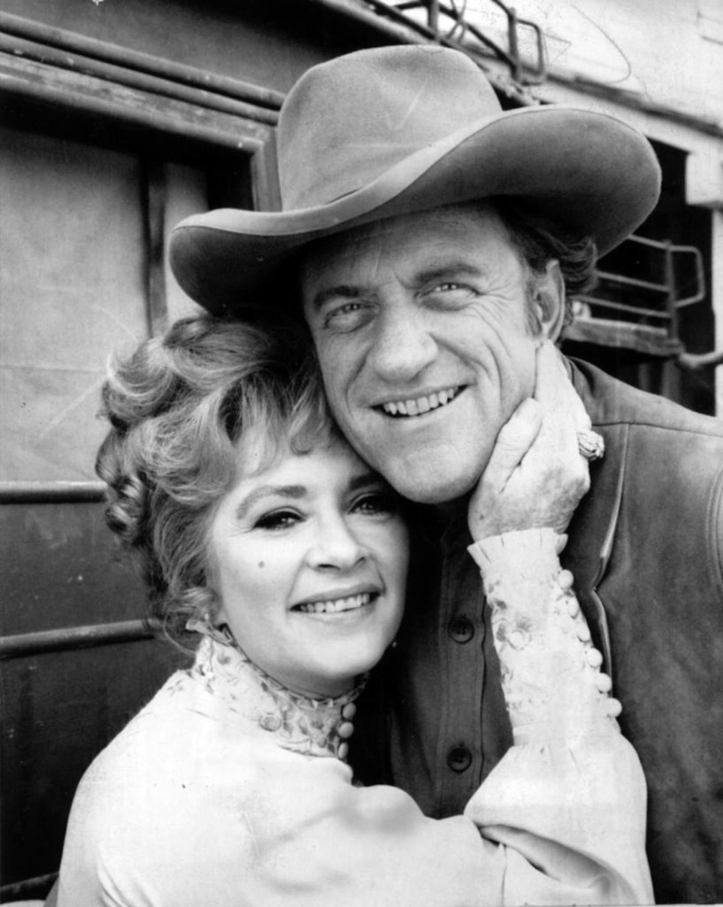 James Arness played lawman Matt Dillon the long-running TV show 'Gunsmoke.' He's shown here with Amanda Blake who played Miss Kitty.