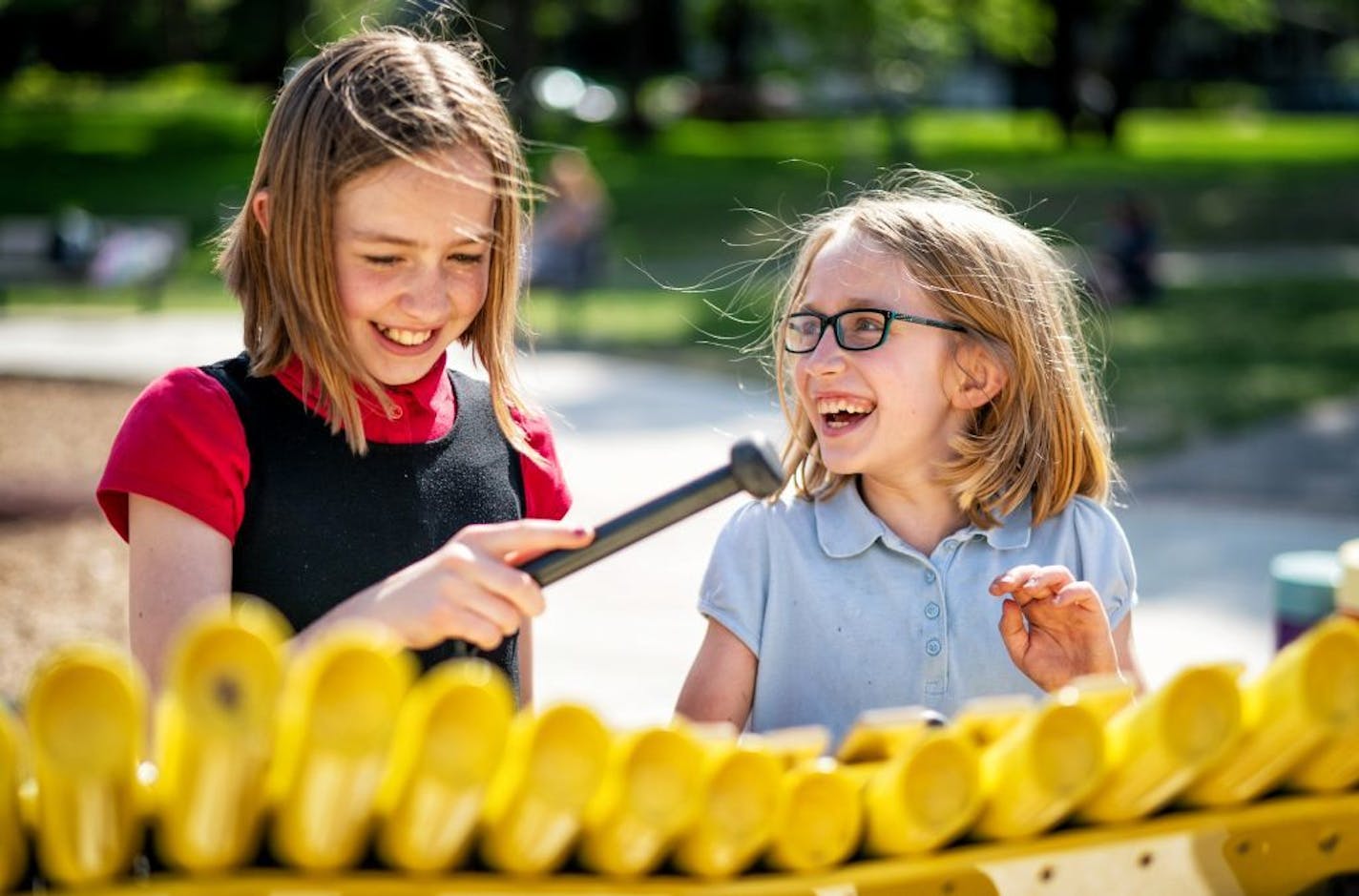 Sisters Kathryn and Eleanor Piersma played the outdoor xylophone at Martin Luther King Park in South Minneapolis. Katheryn, left, is 11 and Eleanor is 9.