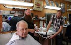 "[Trump]'s got a mouth that runs, but he gets things done," Jim Fisher said as he got a haircut at Cowboy Mel's Barber Shop in Anoka.