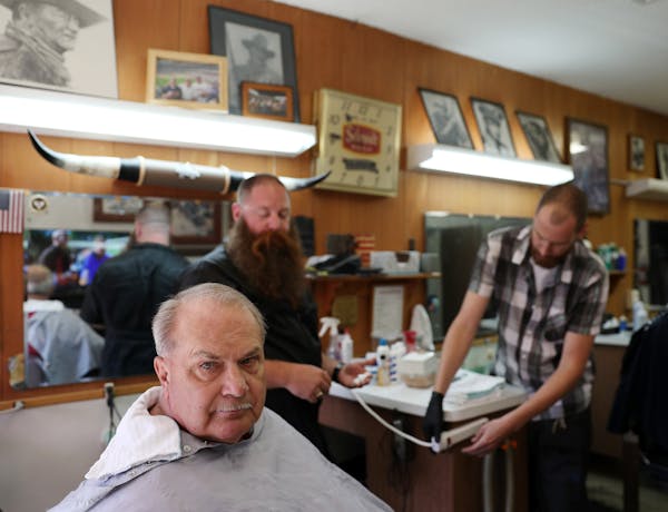 "[Trump]'s got a mouth that runs, but he gets things done," Jim Fisher said as he got a haircut at Cowboy Mel's Barber Shop in Anoka.