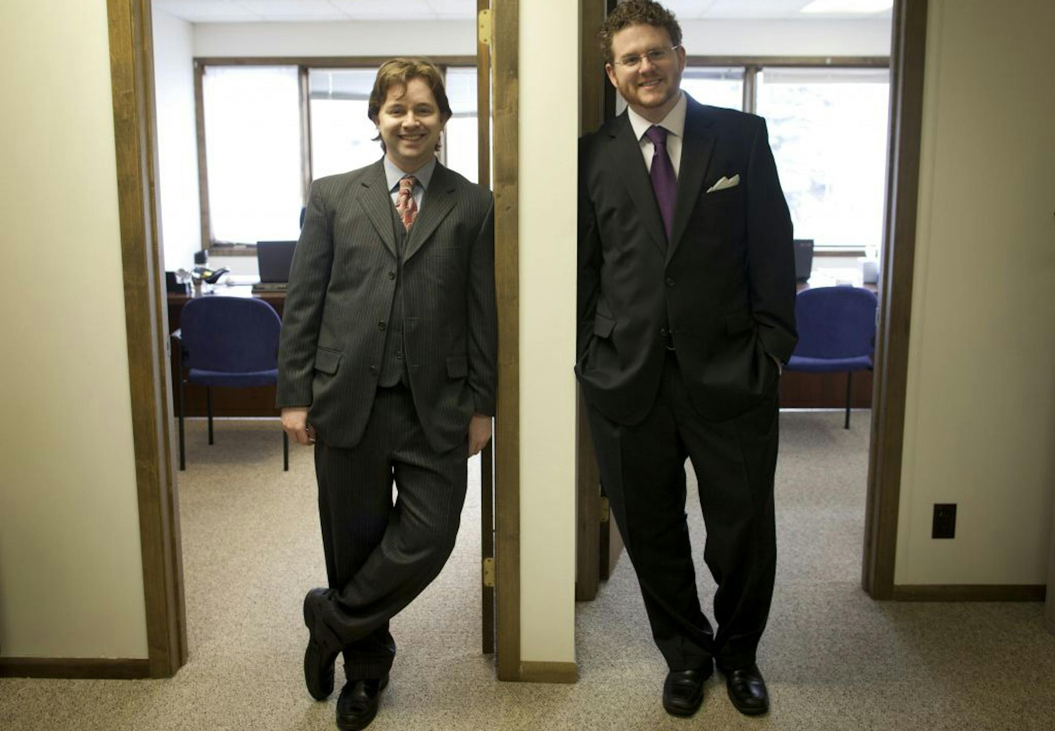 Alexander Wainberg, left, and Kevin Morrison share a small office on Snelling Avenue. Their firm specializes on issues that are pertinent to college students, such as landlord-tenant disputes, social media and alcohol-related concerns.