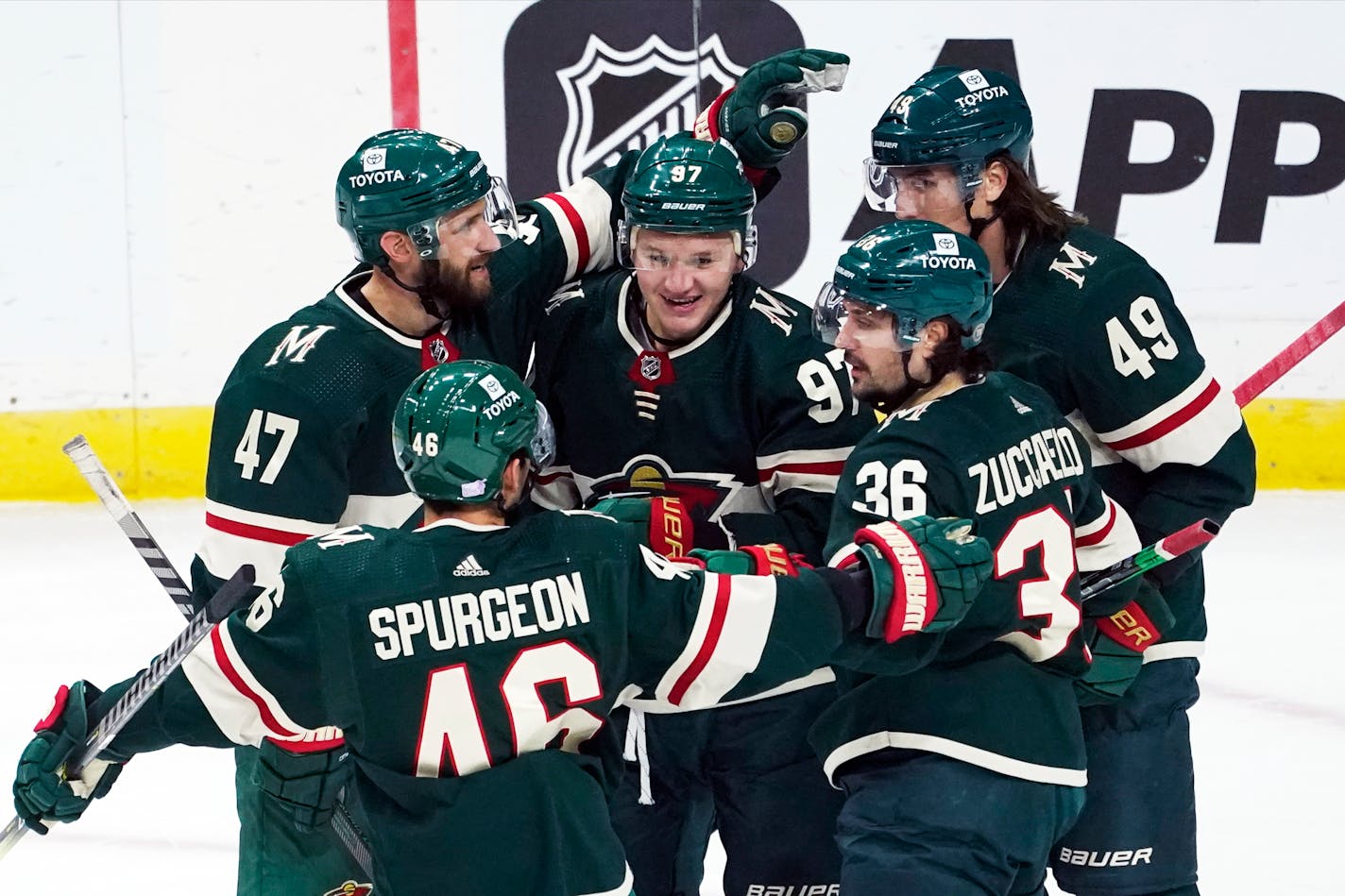 The Wild's Kirill Kaprizov is swarmed by teammates congratulating him on his goal in the first period Thursday.