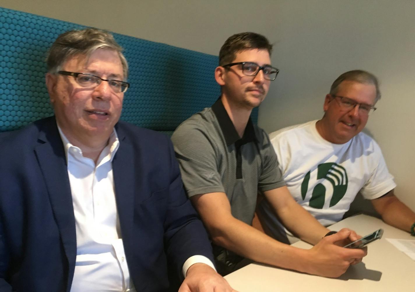 Partners in The Horn, a Facebook alternative private-online network: James Touchi-Peters, Berant Meyer and CEO Jeff Meyer, also owner of White Bear Glass. Photo: Neal.St.Anthony@startribune.com