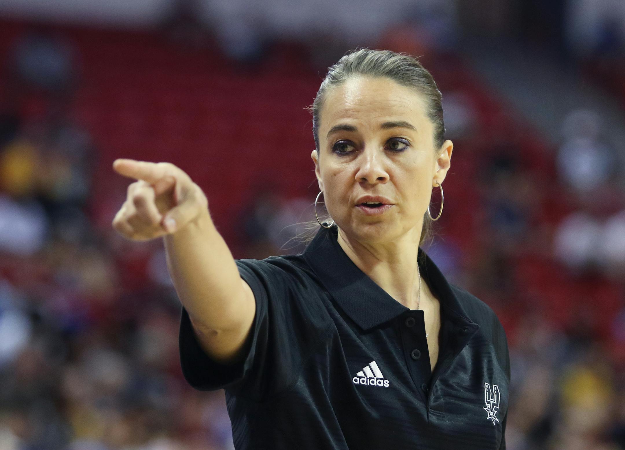 Becky Hammon coaches the San Antonio Spurs during an NBA summer league basketball game against the New York Knicks on Saturday, July 11, 2015, in Las Vegas. (AP Photo/Ronda Churchill)