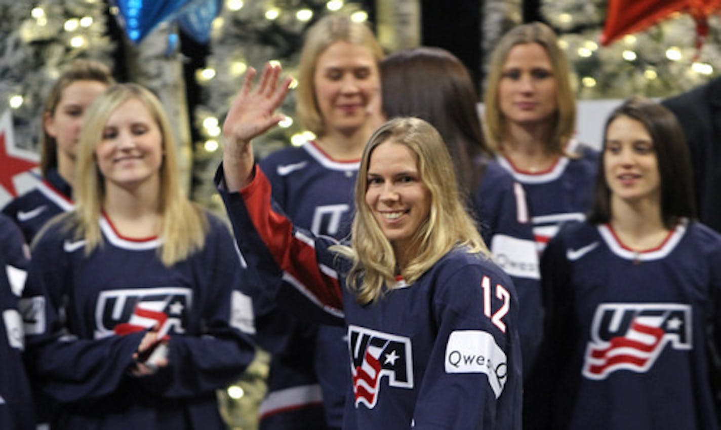 BRUCE BISPING ¥ bbisping@startribune.com Bloomington, MN., Thursday, 12/17/2009]  Jenny Potter of Edina, waved as she was introduced as a member of the 2010 U.S. Olympic Women's Ice Hockey Team.  This is the 4th time Potter has been an Olympian.  After all the introductions, team memebers signed sticks, posters, jerseys and helmets after being introduced at the Mall of America rotunda ceremony.