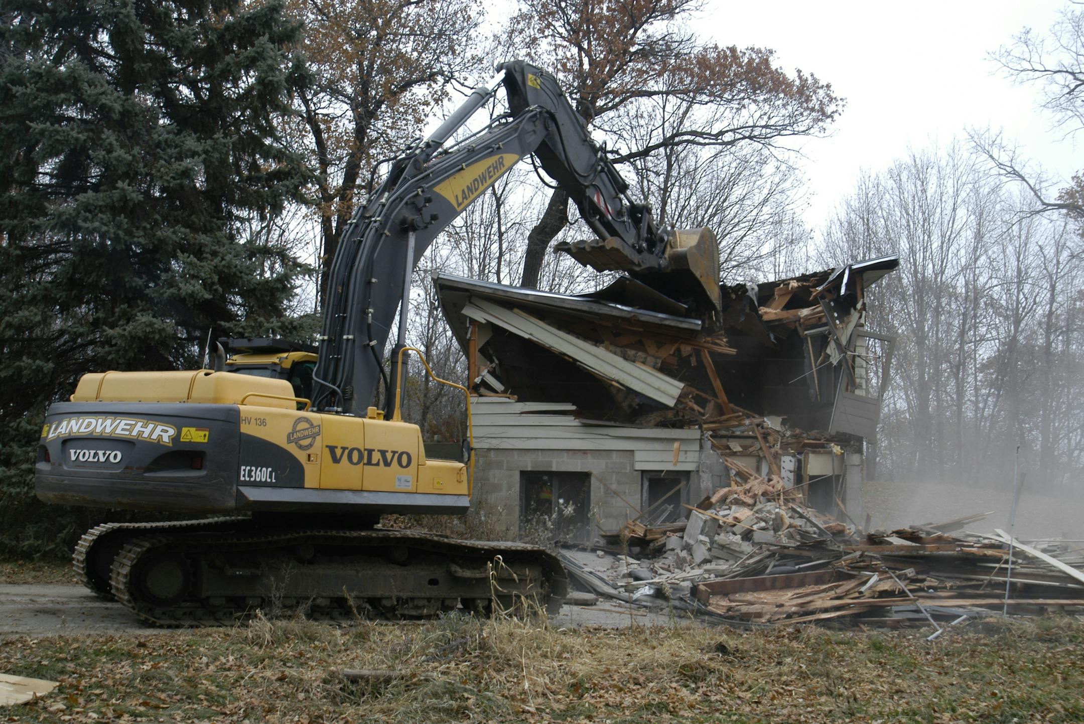 Photo courtesy of Jason McGrew-King The caretatker's house at the former Kingswood Camp fell to the wrecker on Thursday, Nov. 14. The area now will become a Three Rivers Nature Preserve.