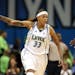 Seimone Augustus, whose career average of 21.2 points per game is the highest in WNBA history, signed a four-year contract Tuesday to remain with the 