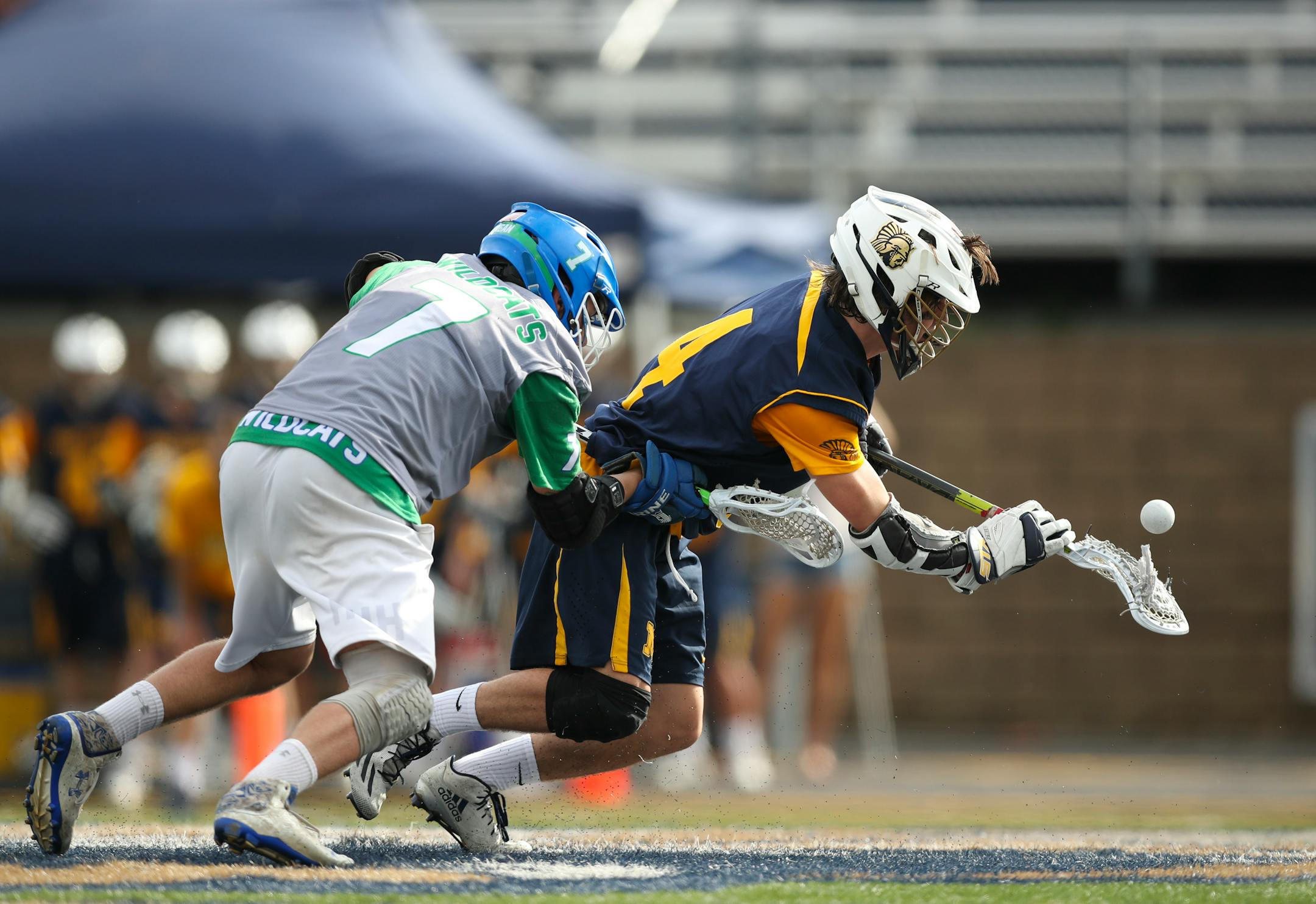 Mahtomedi's Colin Hagstrom won a second half faceoff with Eagan's Timmy Hofmann. ] JEFF WHEELER • jeff.wheeler@startribune.com Mahtomedi beat Eagan 12 - 10 in their quarterfinal game of the Minnesota State High School League's boys' lacrosse tournament Tuesday afternoon, June 12, 2018 at Chanhassen High School.