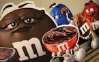 Large cutouts of M&amp;M's characters sit out for auction during the 24th Annual M&amp;M's Collectors Club Convention Wednesday, Sept. 28, 2022 at the