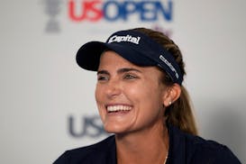 Lexi Thompson laughs during a news conference at the U.S. Women's Open golf tournament at Lancaster Country Club, Tuesday, May 28, 2024, in Lancaster,