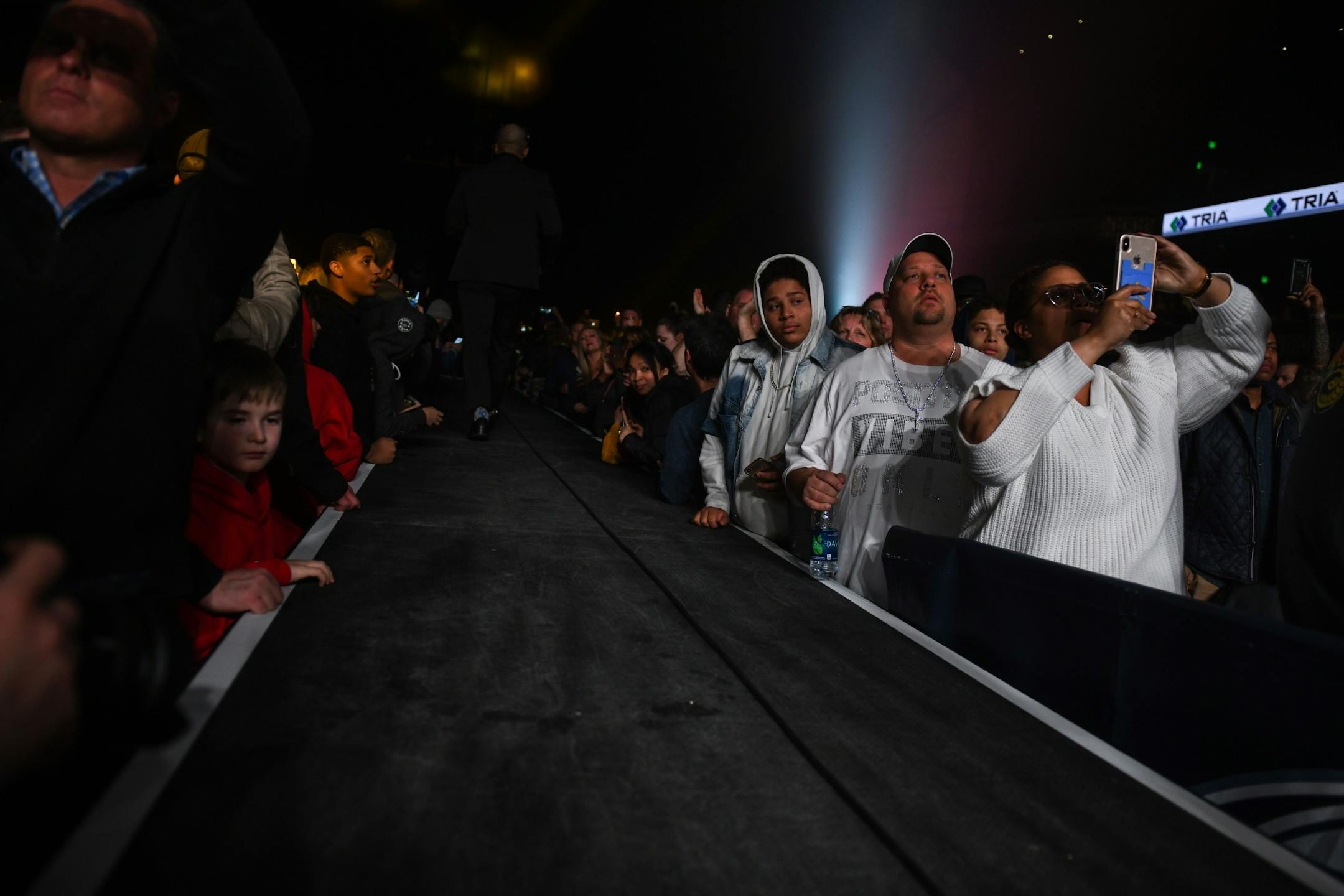 Fans watched as Caleb Truax made his way to the ring from the catwalk.