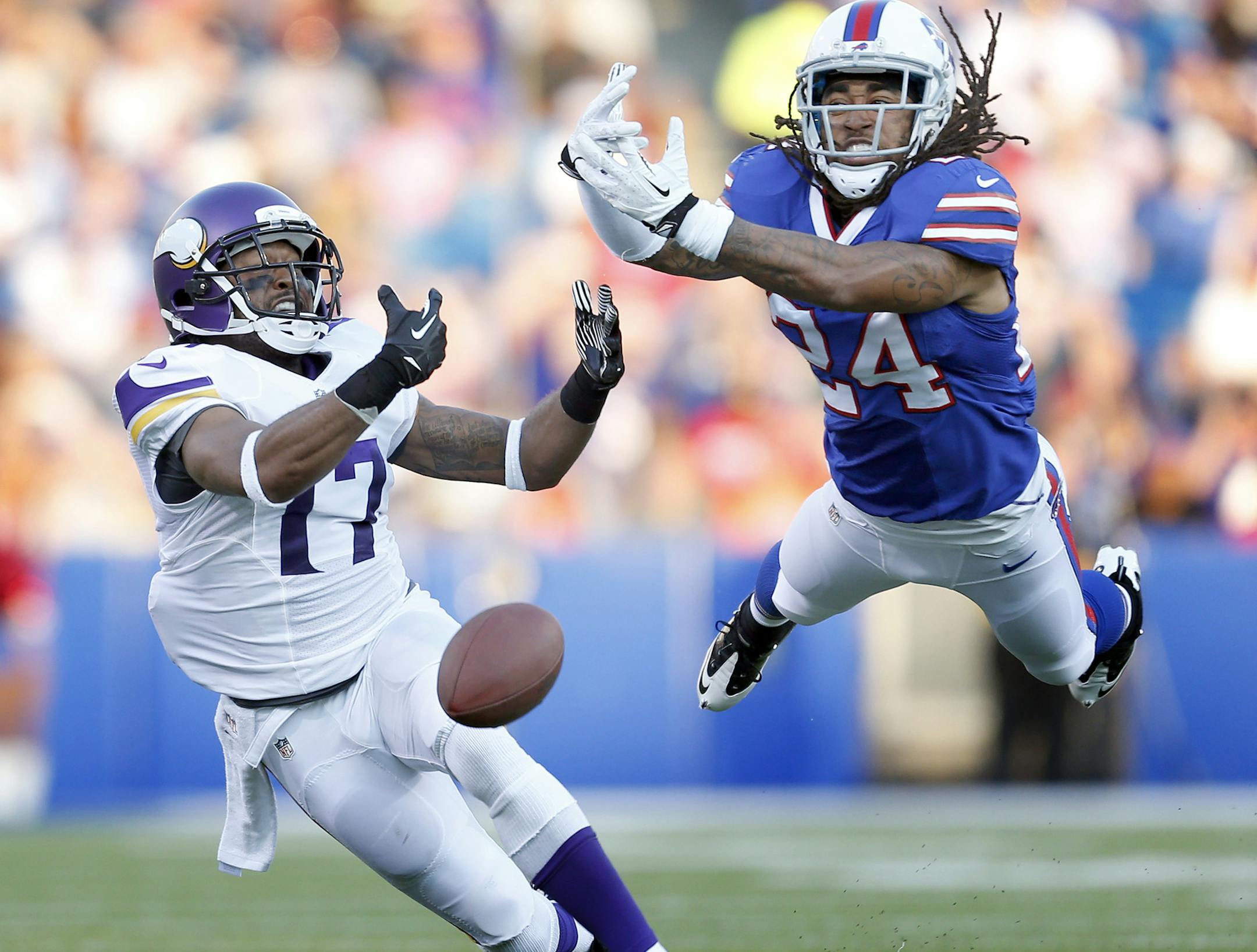 Minnesota Vikings receiver Jarius Wight (17) could not bring in a Christian Ponder pass as he was defended by Stephon Gilmore (24) in the first quarter. of the preseason game against Buffalo.