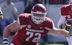 Arkansas offensive lineman Frank Ragnow defends against Toledo in the first half of an NCAA college football game in Little Rock, Ark., Saturday, Sept