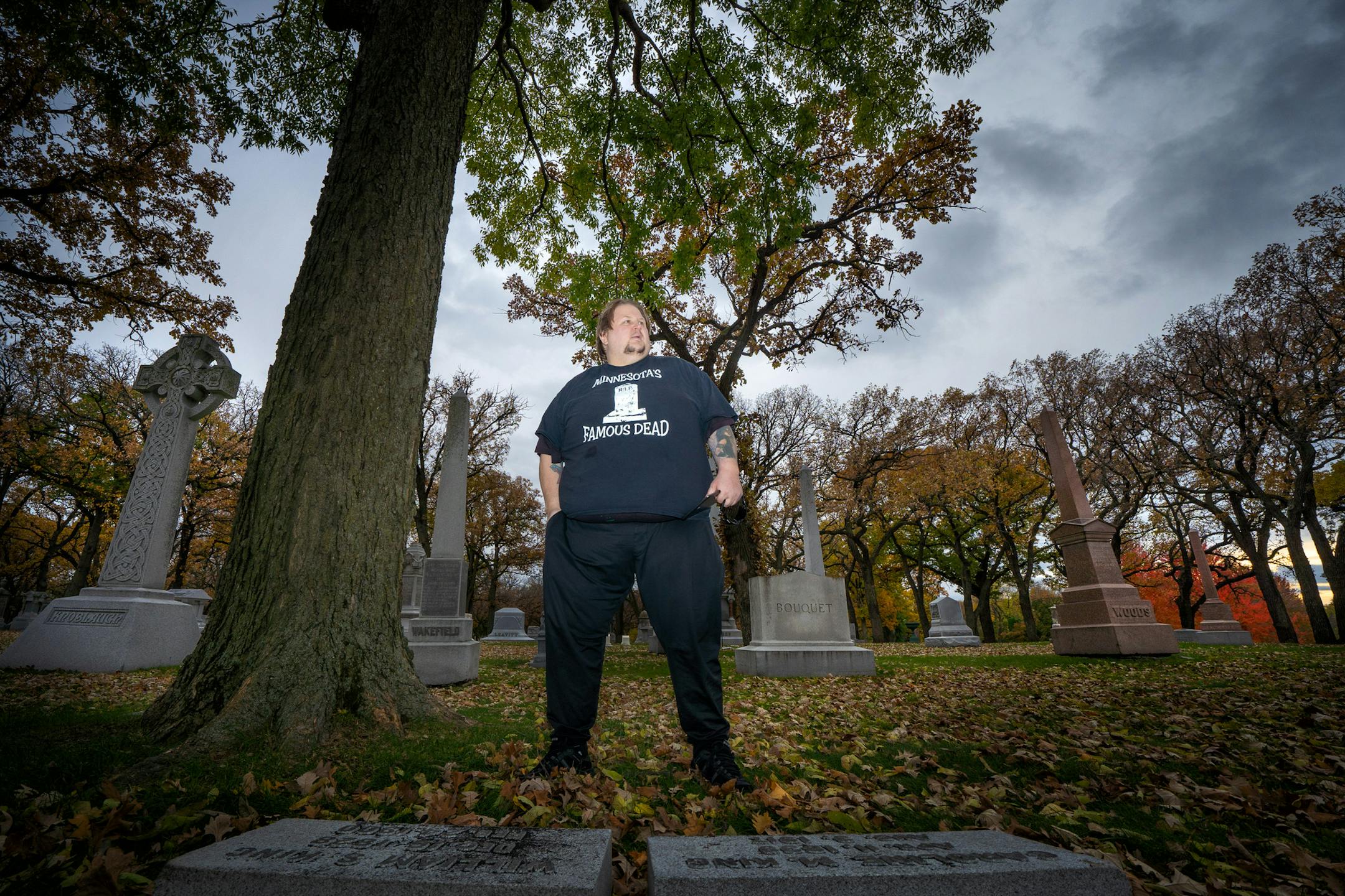 Paranormal Investigator and Pro Wrestler Bryan Dorn explored Lakewood Cemetery in Minneapolis, carefully avoiding stepping on grave markers and gently brushing leaves away from them as he looked for familiar names and told stories about them and the lives they led. ] GLEN STUBBE • glen.stubbe@startribune.com Wednesday, October 23, 2019 The paths of glory lead but to the grave. But also to the Facebook page of Bryan "Ian Xavier" Dorn, a paranormal investigator, professional wrestler and do