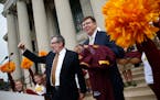 University of Minnesota President Eric Kaler, left, with Chris Policinski, president and CEO of Land O'Lakes, who pledged to invest $25 million in U o