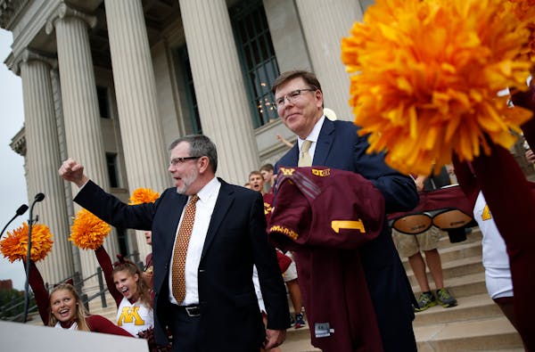 University of Minnesota President Eric Kaler, left, with Chris Policinski, president and CEO of Land O'Lakes, who pledged to invest $25 million in U o