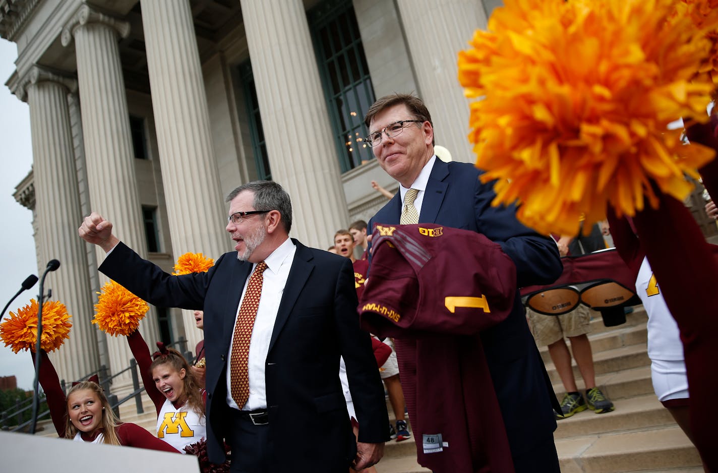 University of Minnesota President Eric Kaler, left, with Chris Policinski, president and CEO of Land O'Lakes, who pledged to invest $25 million in U of M academics and Gopher athletics. This was the first big step in fulfilling the $190 million athletics facility master plan.