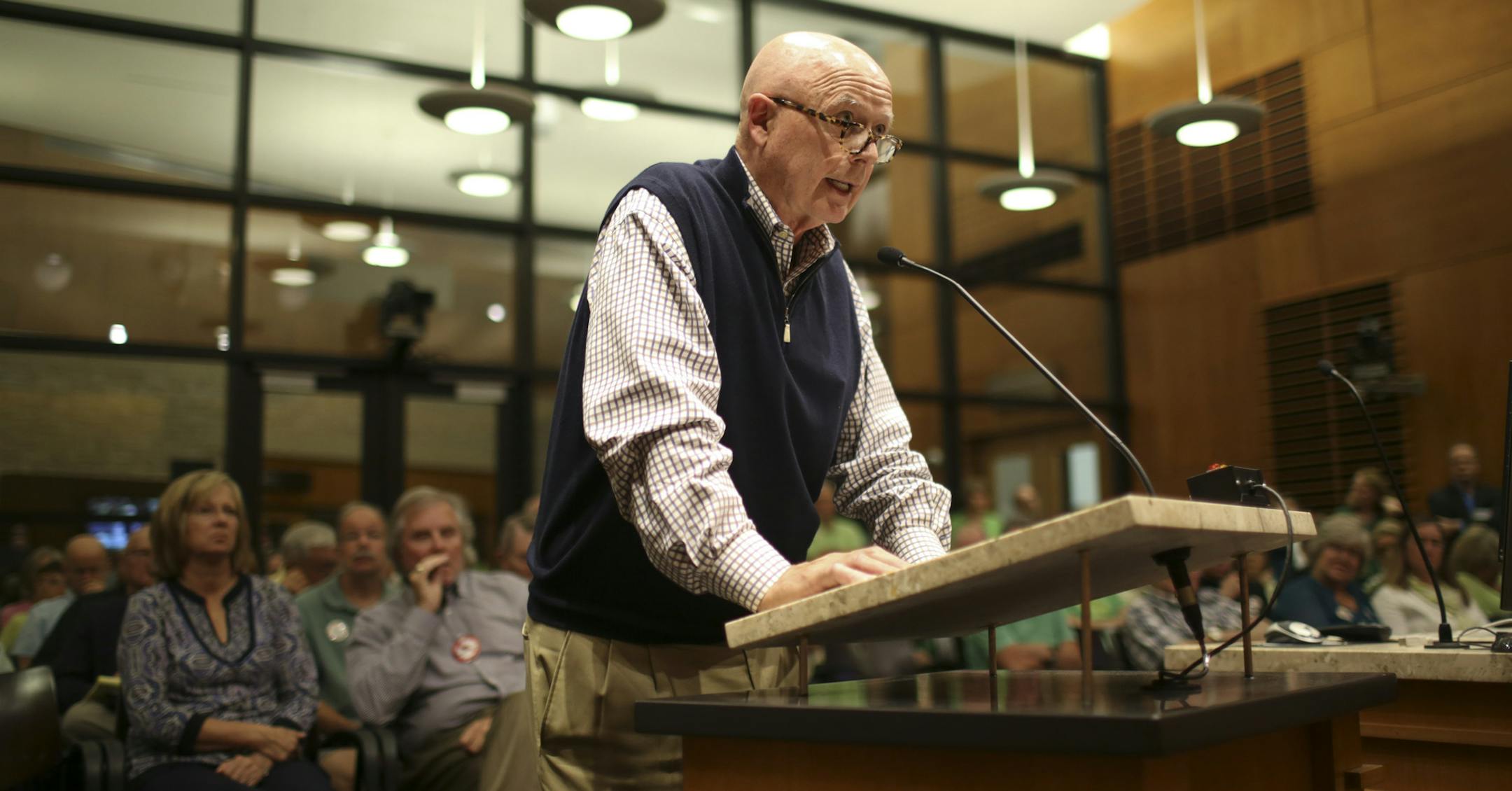Mike Nelson spoke in opposition to the proposed housing development for young people during a meeting of the Edina City Council Tuesday night. ] JEFF WHEELER ‚Ä¢ jeff.wheeler@startribune.com The Edina City Council took up the controversial topic of a teen homeless shelter at their meeting Tuesday night, September 2, 2014 at the Edina City Hall.