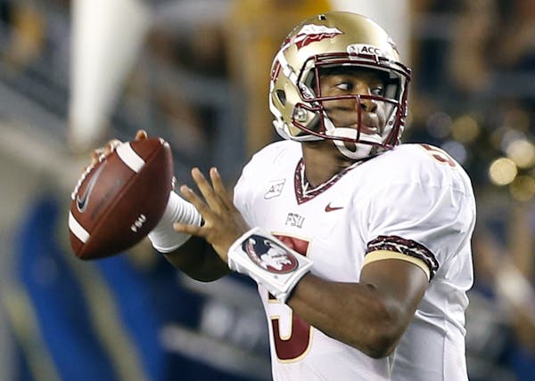 Florida State quarterback Jameis Winston (5) plays in an NCAA football game between Florida State and Pittsburgh on Monday, Sept. 2, 2013 in Pittsburg