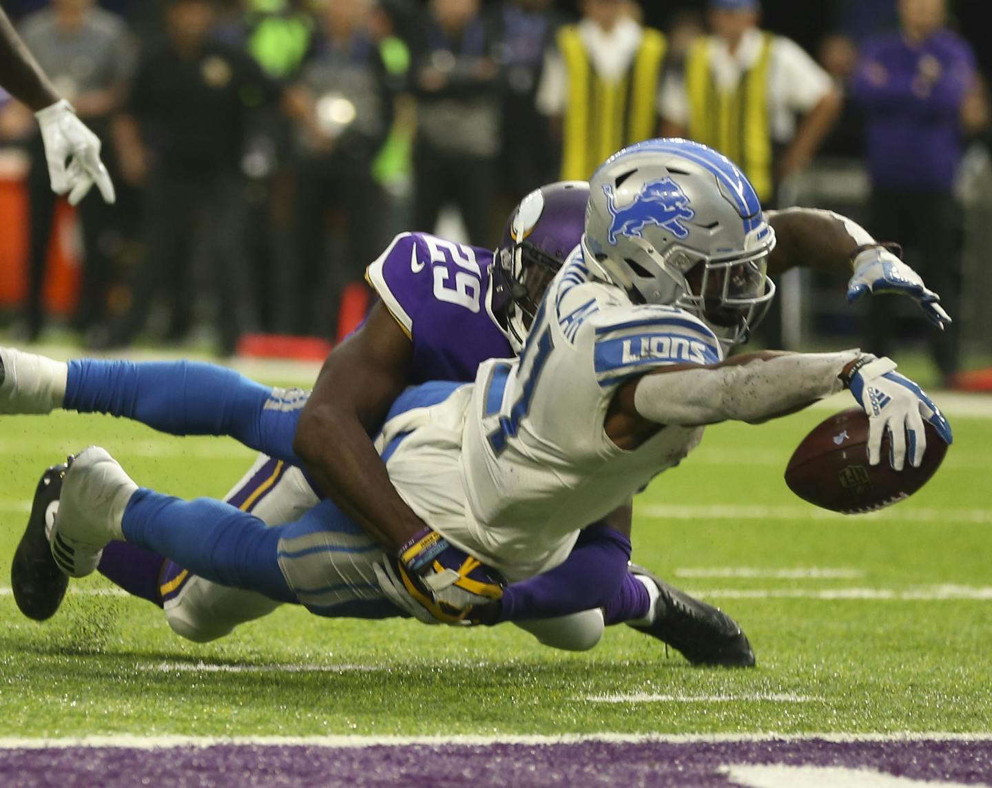 Detroit Lions running back Ameer Abdullah (21) scored from the two yard line as he was nearly stopped by Minnesota Vikings cornerback Xavier Rhodes (29) in the third quarter. Officials initially ruled him down by contact, but a Detroit challenge gave the Lions what proved to be the winning touchdown. ] JEFF WHEELER &#xef; jeff.wheeler@startribune.com The Minnesota Vikings lost to the Detroit Lions 14-7 Sunday afternoon, October 1, 2017 at U.S. Bank Stadium in Minneapolis.