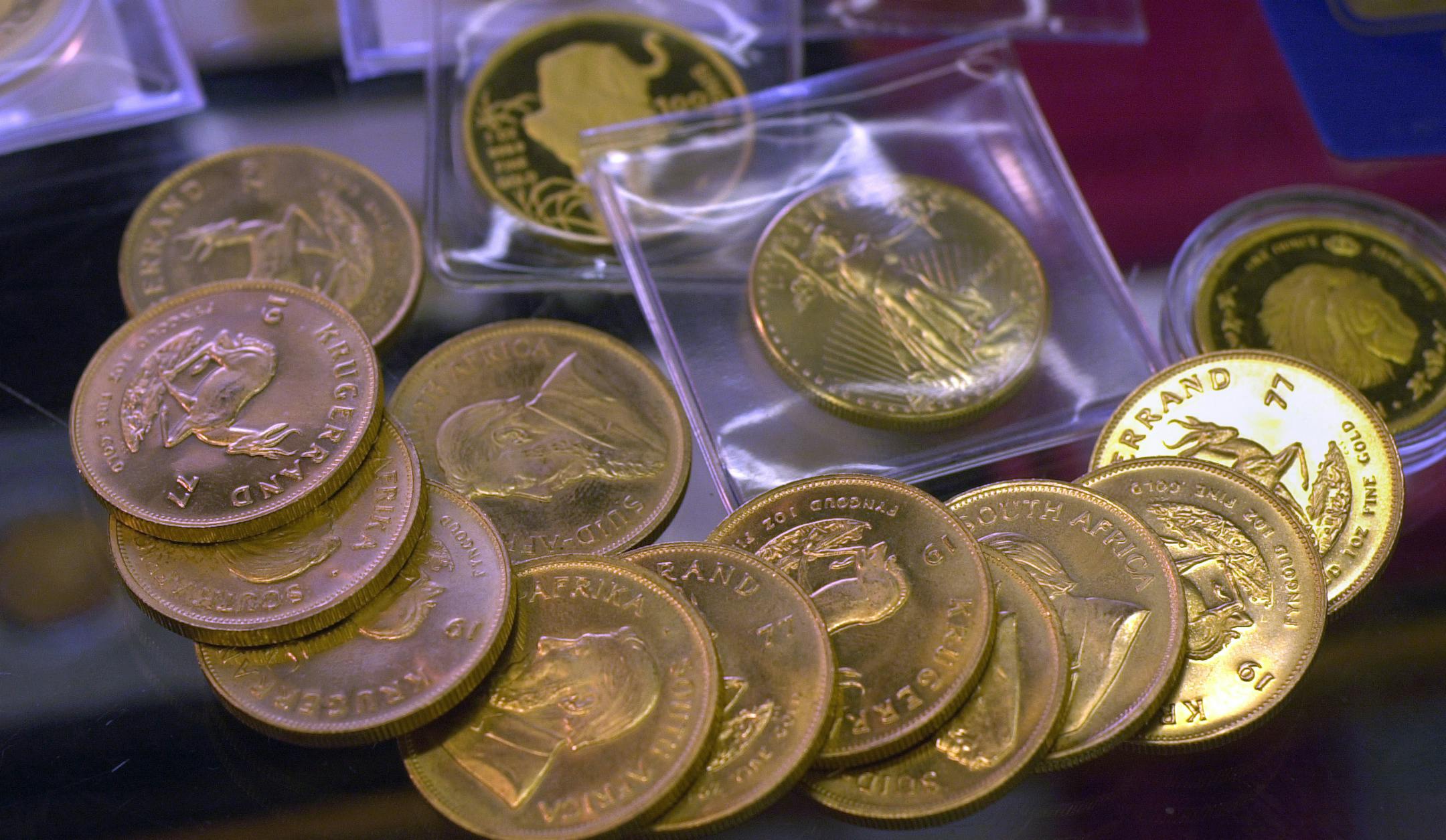 GENERAL INFORMATION: Minneapolis,Mn. Friday 5/31/2002 Gold rose to its highest level in 31 months as rising tensions in the Middle East, falling U.S. stocks and a weakening dollar spurred investors to seek a haven. The metal has its biggest monthly gain since September 1999. 550. And not surprisingly, gold coin dealers in the Twin Cities are reporting a huge surge in the number of customers who are buying. IN THIS PHOTO: Krugerand's and a Golden Eagle on the counter top of Premium Quality Coin O