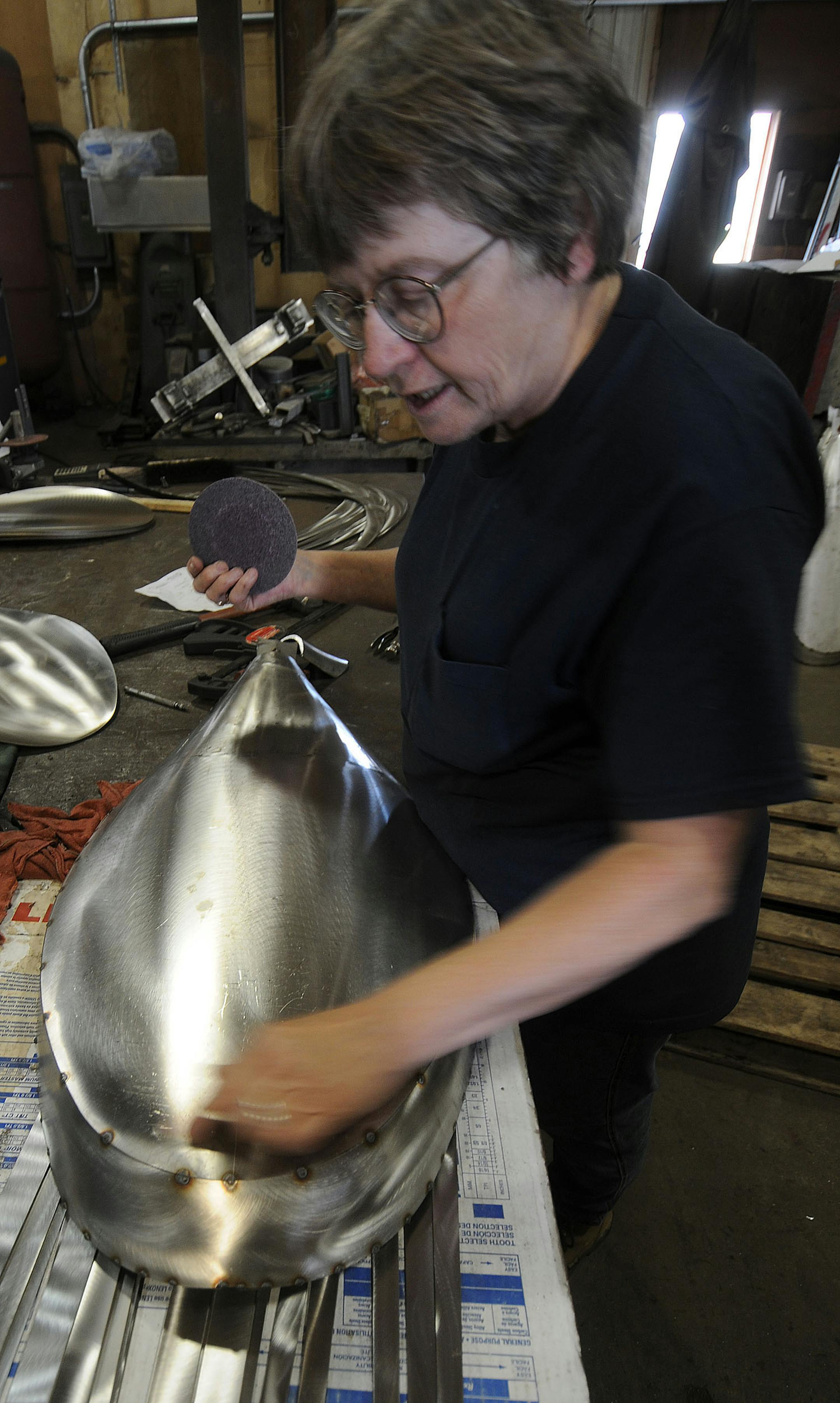 Richard Sennott�rsennott@startribune.comPopularity of public art instalations is increasing. Edina is going to have a large stainless steel pinecone installed.The artist Marcia McEachron gave a tour of the floor of Linders Specialties where the pine cone is being fabricated.
