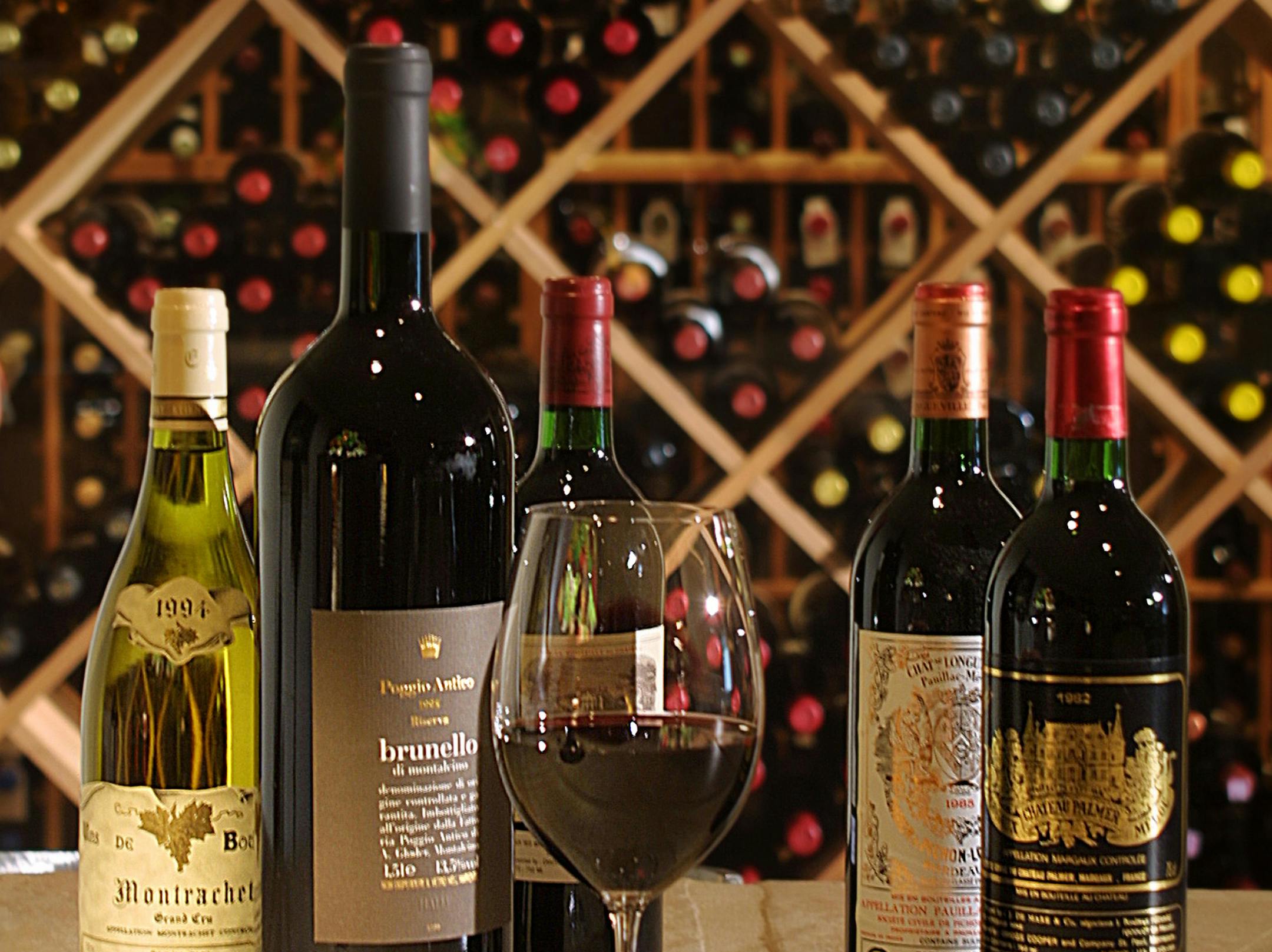 GENERAL INFORMATION: TASTE-Wine section 2001:A feature for the cover of the Taste section on Wine Cellars. Three locations. to get a flavor of what people are doing with their storage areas. IN THIS PHOTO: TASTE-Wine section 2001:A feature for the cover of the Taste section on Wine Cellars. Three locations. to get a flavor of what people are doing with their storage areas. Ken Andersen's Wine room off of the entertainment room in his houses lower level. ORG XMIT: MIN2013110214163120