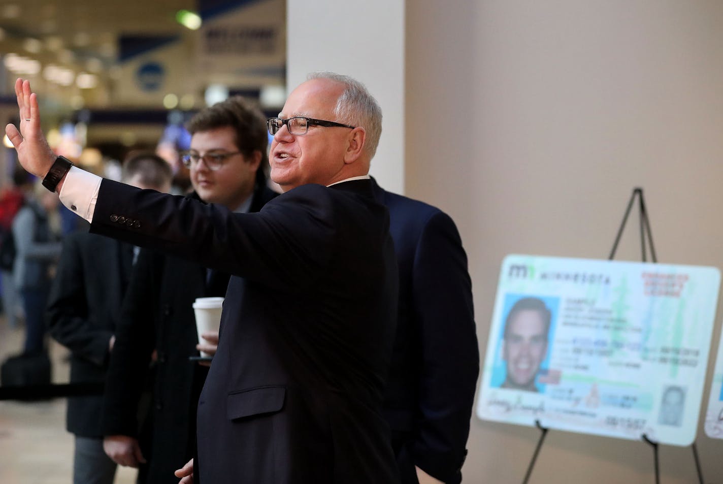 Gov. Tim Walz waves to a passing traveler before the start of a press conference debuting the new REAL ID Office at MSP Airport Wednesday, March 4, 2020, in Minneapolis, MN.] DAVID JOLES &#x2022; david.joles@startribune.com Minneapolis travelers flying out of MSP will have a REAL ID office, next to the Prince store, to provide a convenient way for travelers to apply for their REAL ID.