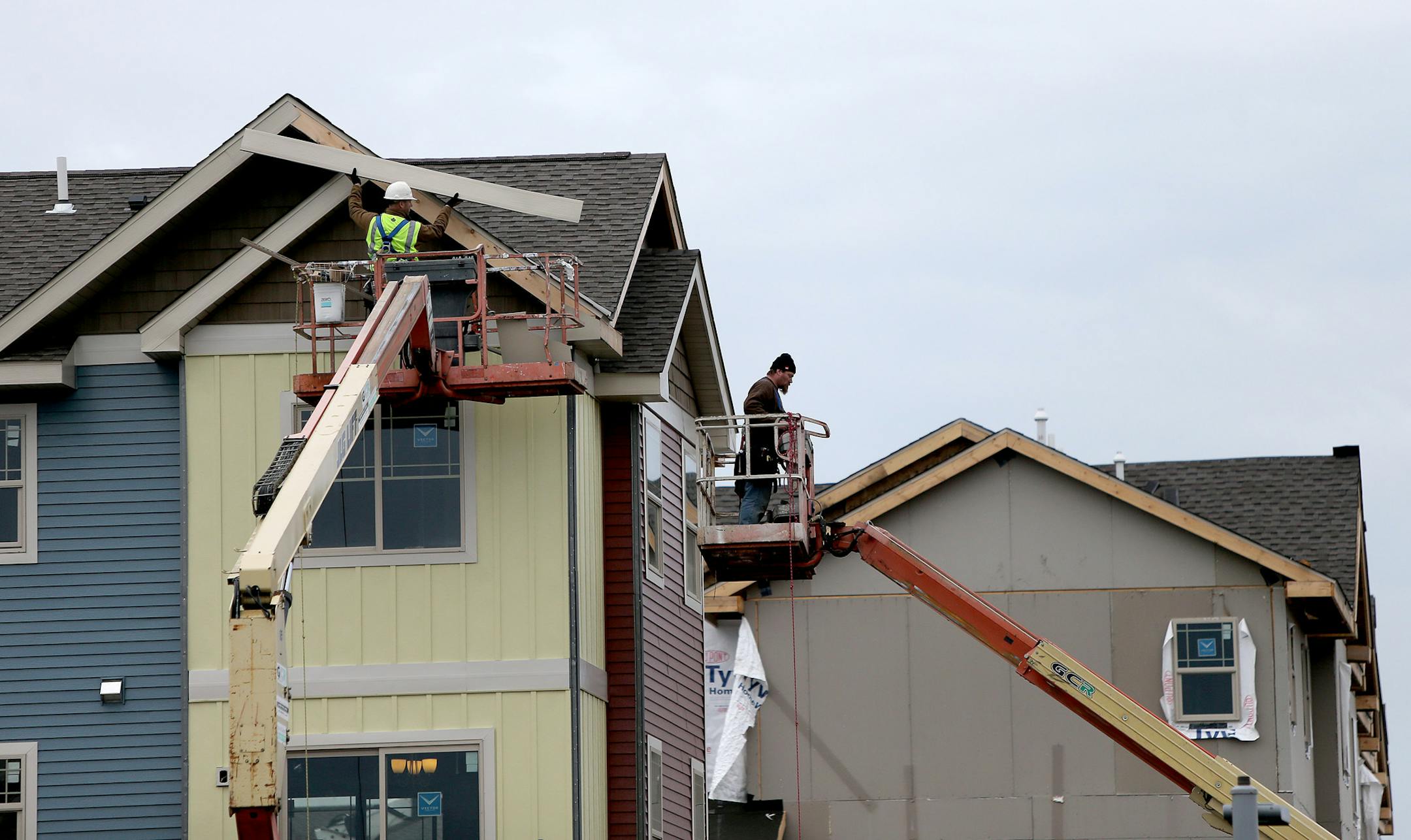 A construction crew worked on building townhomes in Ramsey last year.