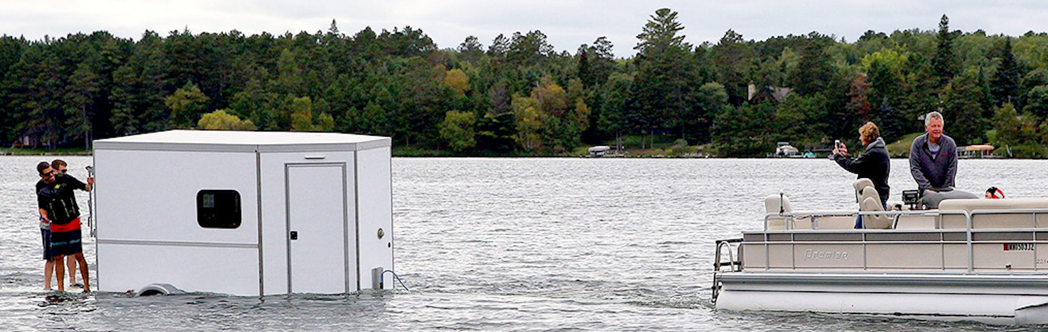 Core Ice founders Jesse Gamble and Kyle Bjorkman only make the claim to customers that the materials for their new fish houses float. Here they proved to themselves that one of the units would float behind a pontoon boat when pulled across open water.