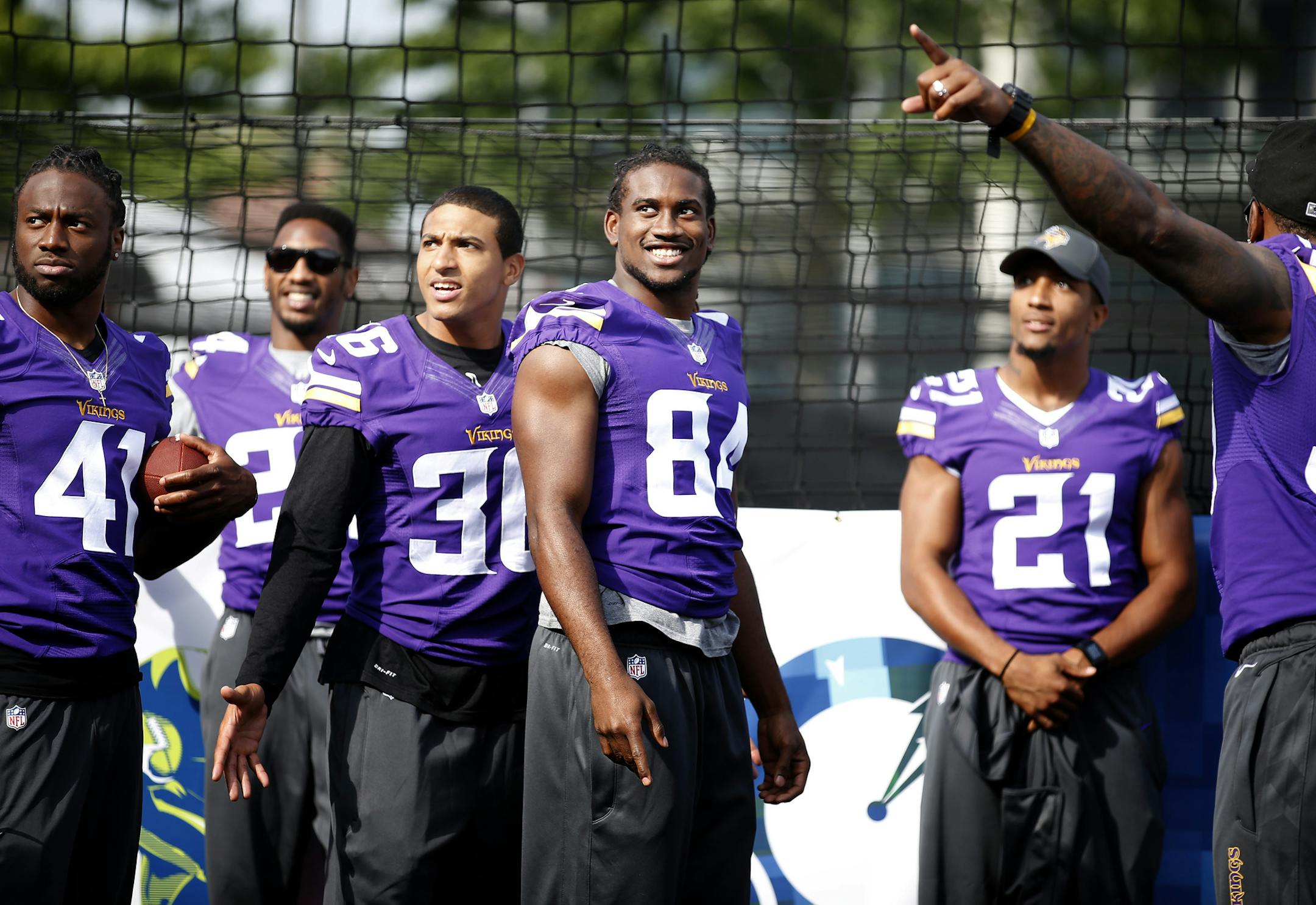 Minnesota Vikings players Mistral Raymond (41), Robert Blanton (36), Cordarrelle Paterson (84), Josh Robinson (21) and Erin Henderson (50) at Tuesday‚Äôs event outside of Wembley Stadium shortly after the team arrived in London for Sunday's game vs. the Pittsburgh Steelers. ] CARLOS GONZALEZ cgonzalez@startribune.com September 24, 2013, London, England, UK, Wembley Stadium, ,NFL, Minnesota Vikings Community Day ‚Äì Wembley Stadium Vikings,